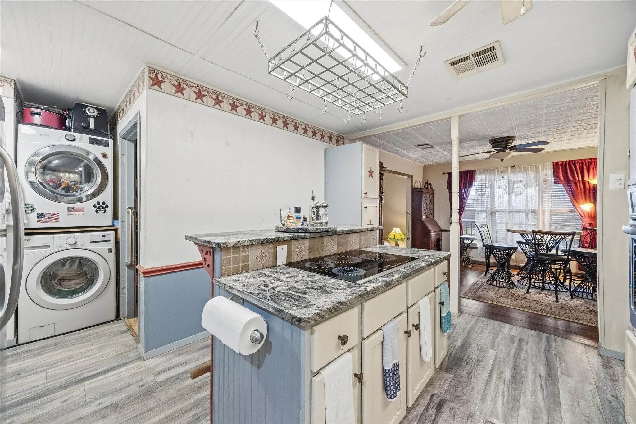 Kitchen opens onto dining area