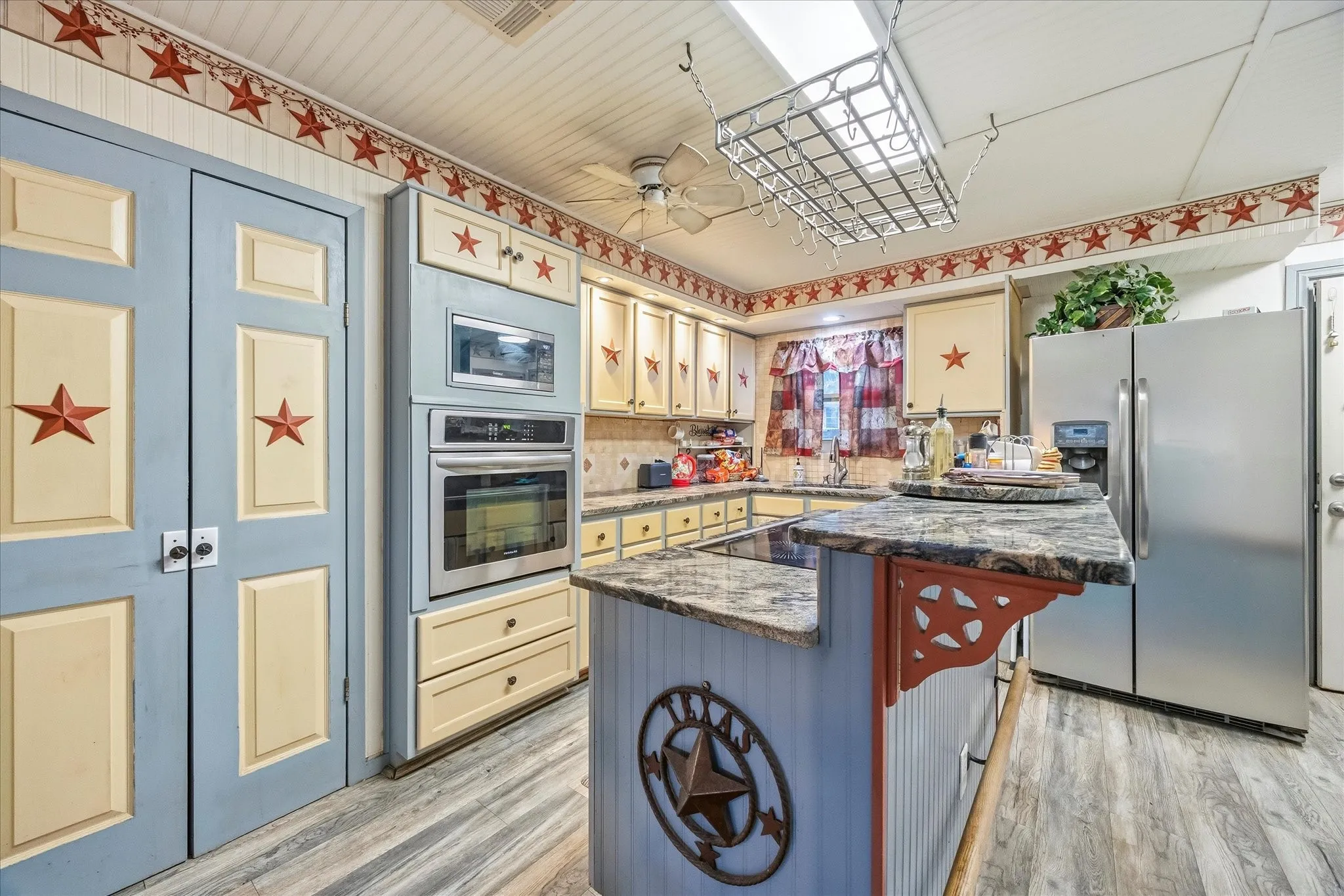 Kitchen includes center island-breakfast bar
