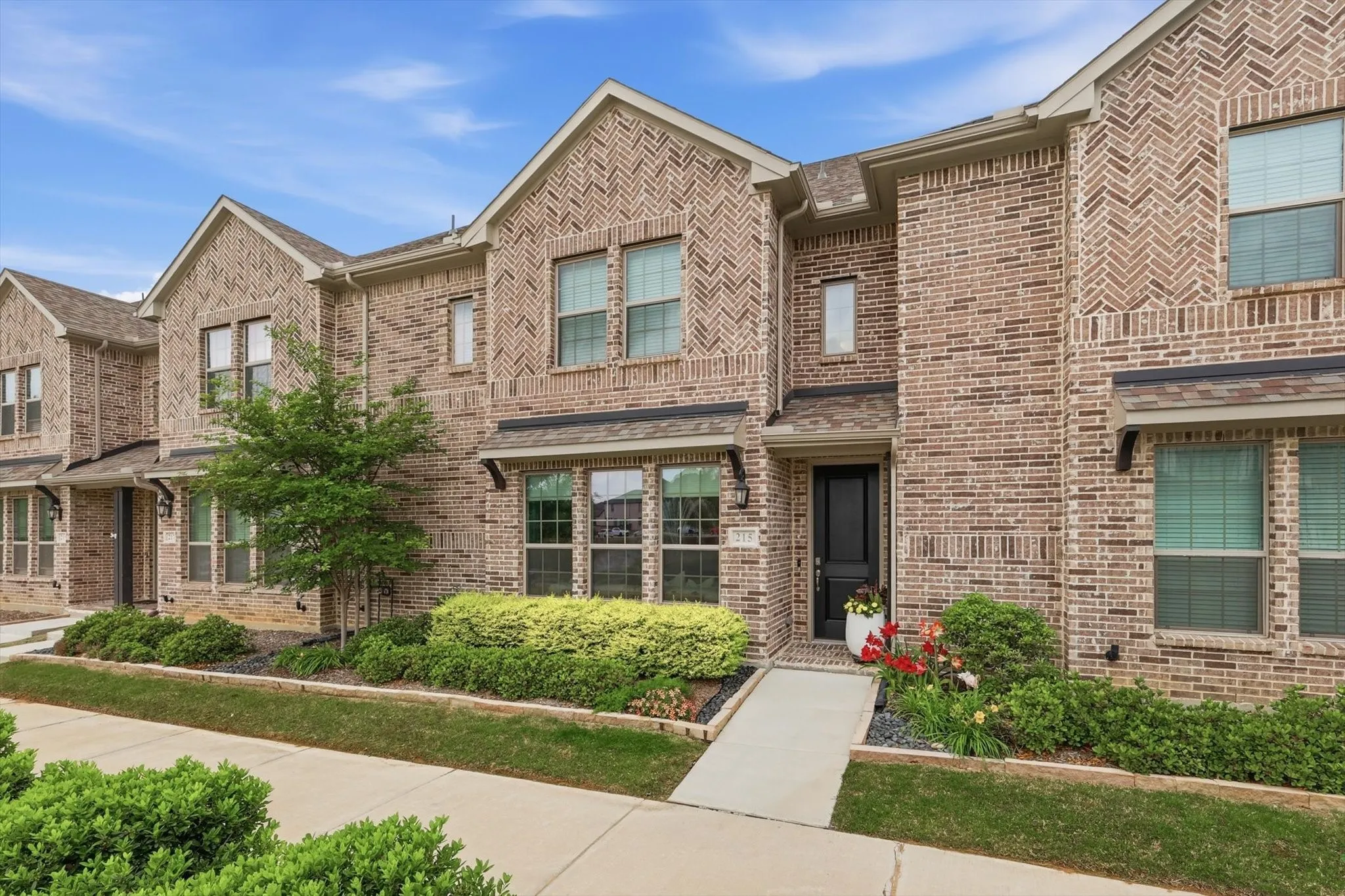 Welcome to Founders Park. This Luxurious Townhome features a Bright Open-Concept with a Spacious and Airy Layout, Abundant Natural Light with Lots of Upgrades and Designer Features throughout this 3 Bedroom, 2.5 Bath, 1954sqft Townhome that includes an Extra-Large 2-Car Garage with Alley Access, Epoxy Floors, and Abundant Storage Space adding convenience, while the HOA Covers Roof Maintenance and Replacement, providing Additional Value and Peace of Mind.