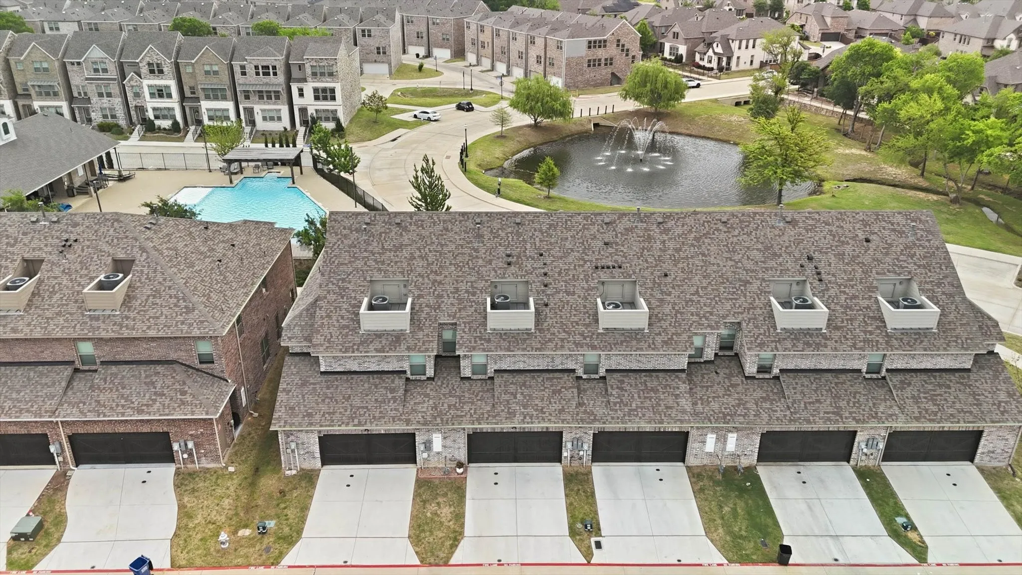 Extra-Large 2-Car Garage with Alley Access, Epoxy Floors, and Abundant Storage Space adding convenience, while the HOA Covers Roof Maintenance and Replacement, providing Additional Value and Peace of Mind.