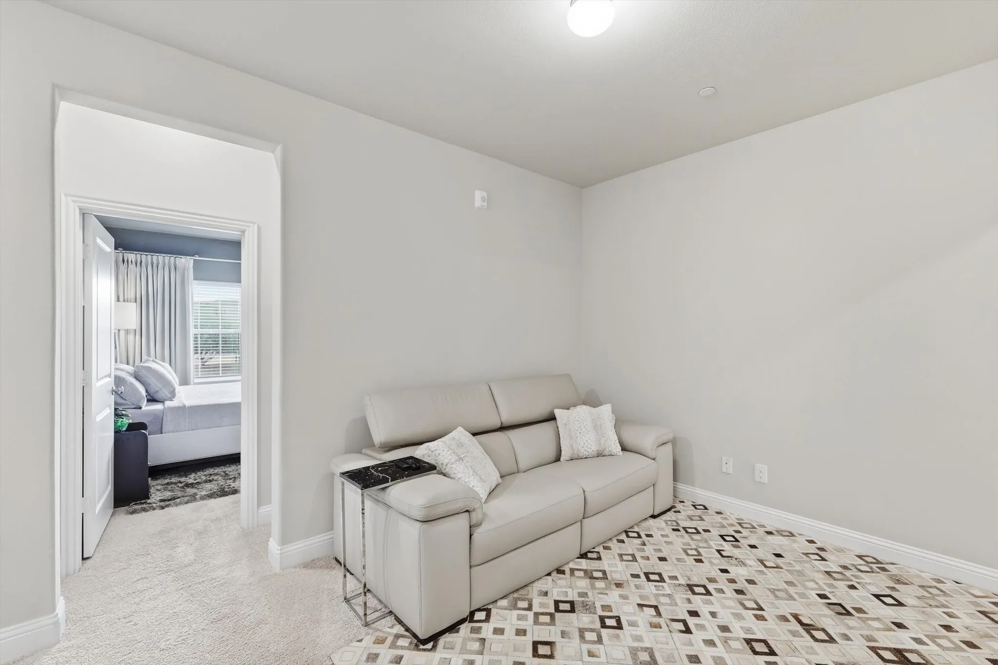 The Family Room offers a Quiet, Versatile Environment ideal for Relaxation or Entertainment with a Warm and Comfortable Ambiance.