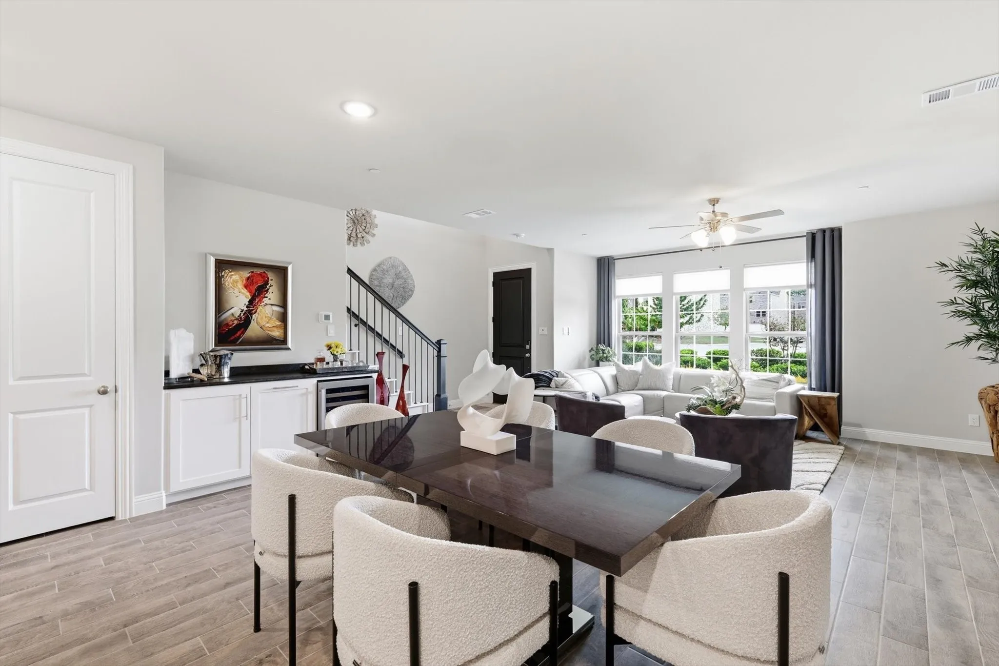 The Large Dining Area offers ample space for a Large Dining Table, Buffet, and Dry Bar, making it perfect for Entertaining and Everyday Dining.