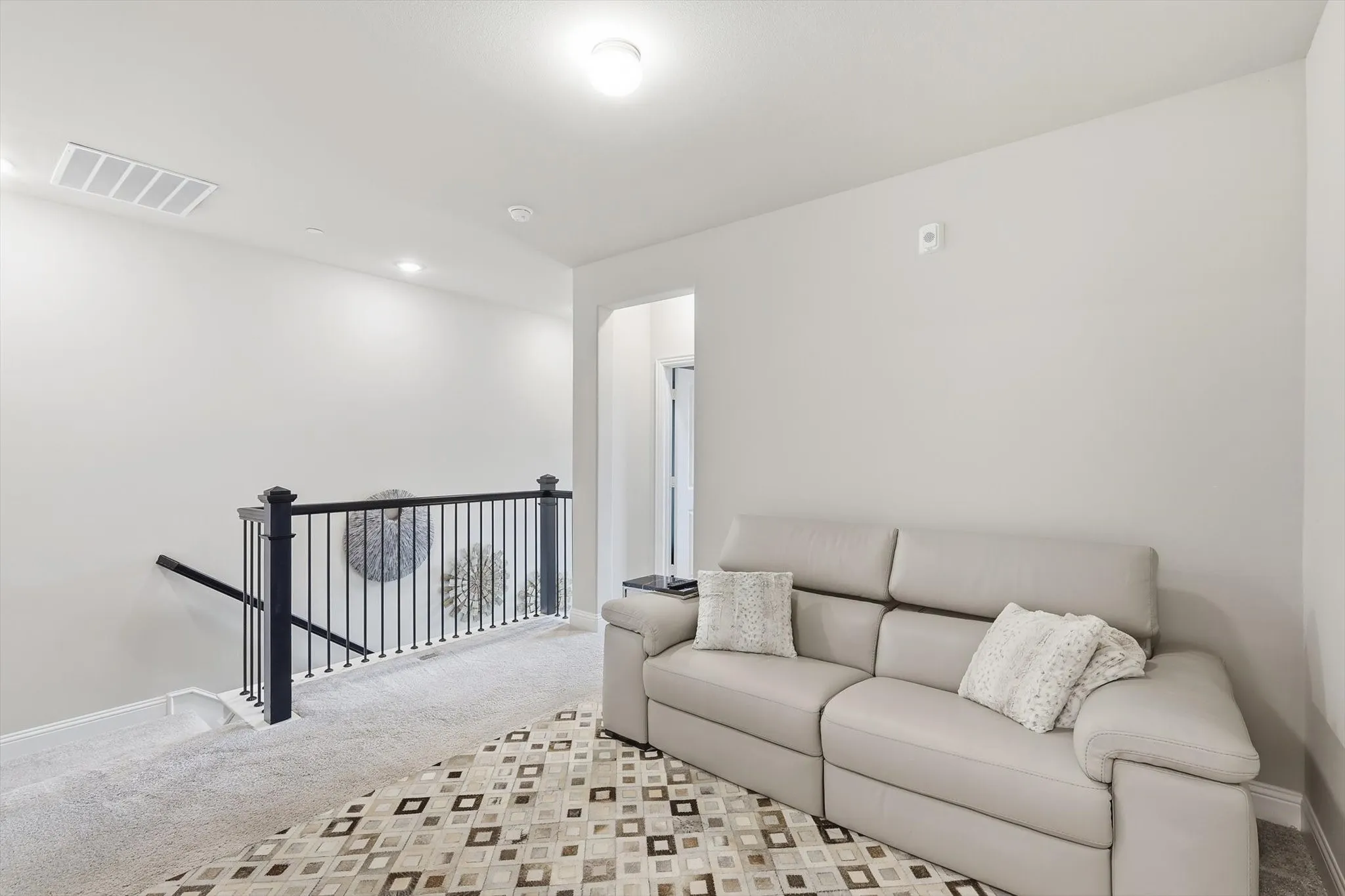The Family Room offers a Quiet, Versatile Environment ideal for Relaxation or Entertainment with a Warm and Comfortable Ambiance.