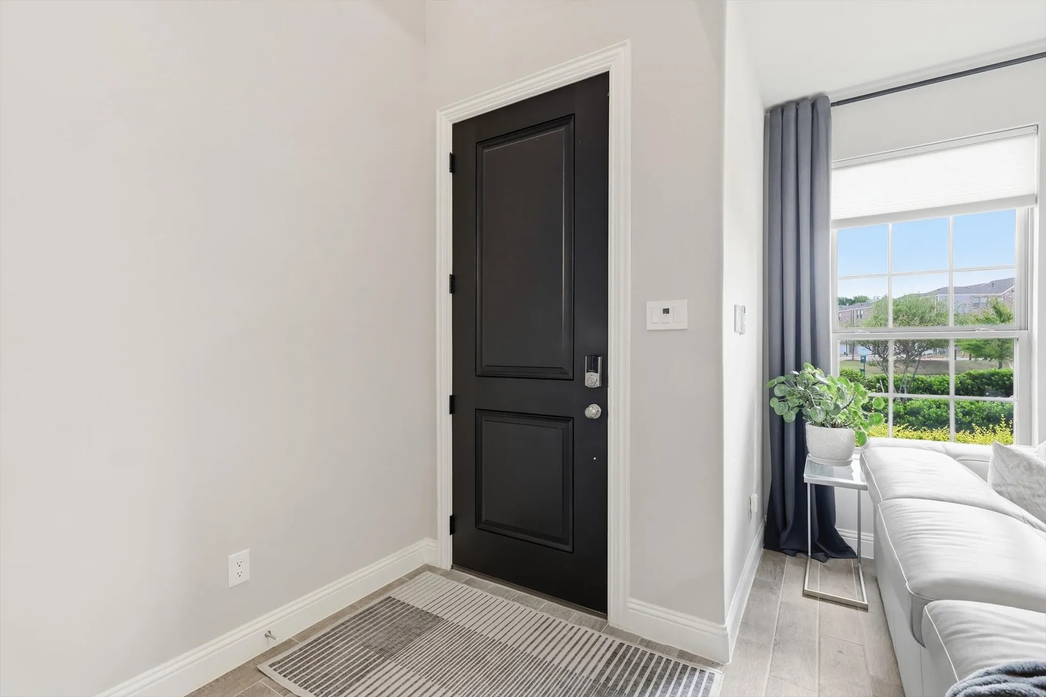 Once you enter this Luxurious Townhome you'll notice the Bright Open-Concept and Spacious and Airy Layout starting with your first step onto the Upgraded Wood-Look Tile Flooring with Durability and Warmth that Extends throughout the Main Floor.