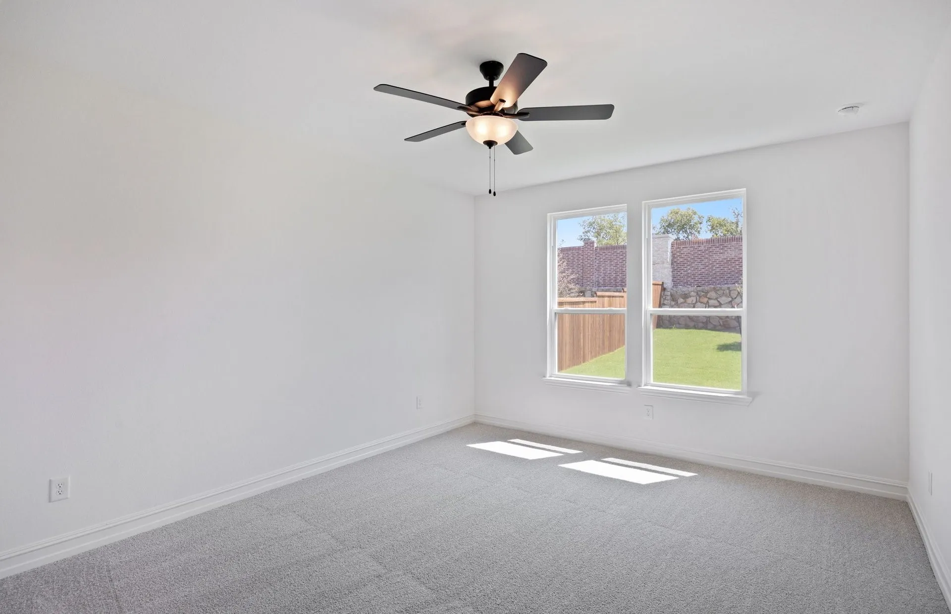 Primary suite with large window