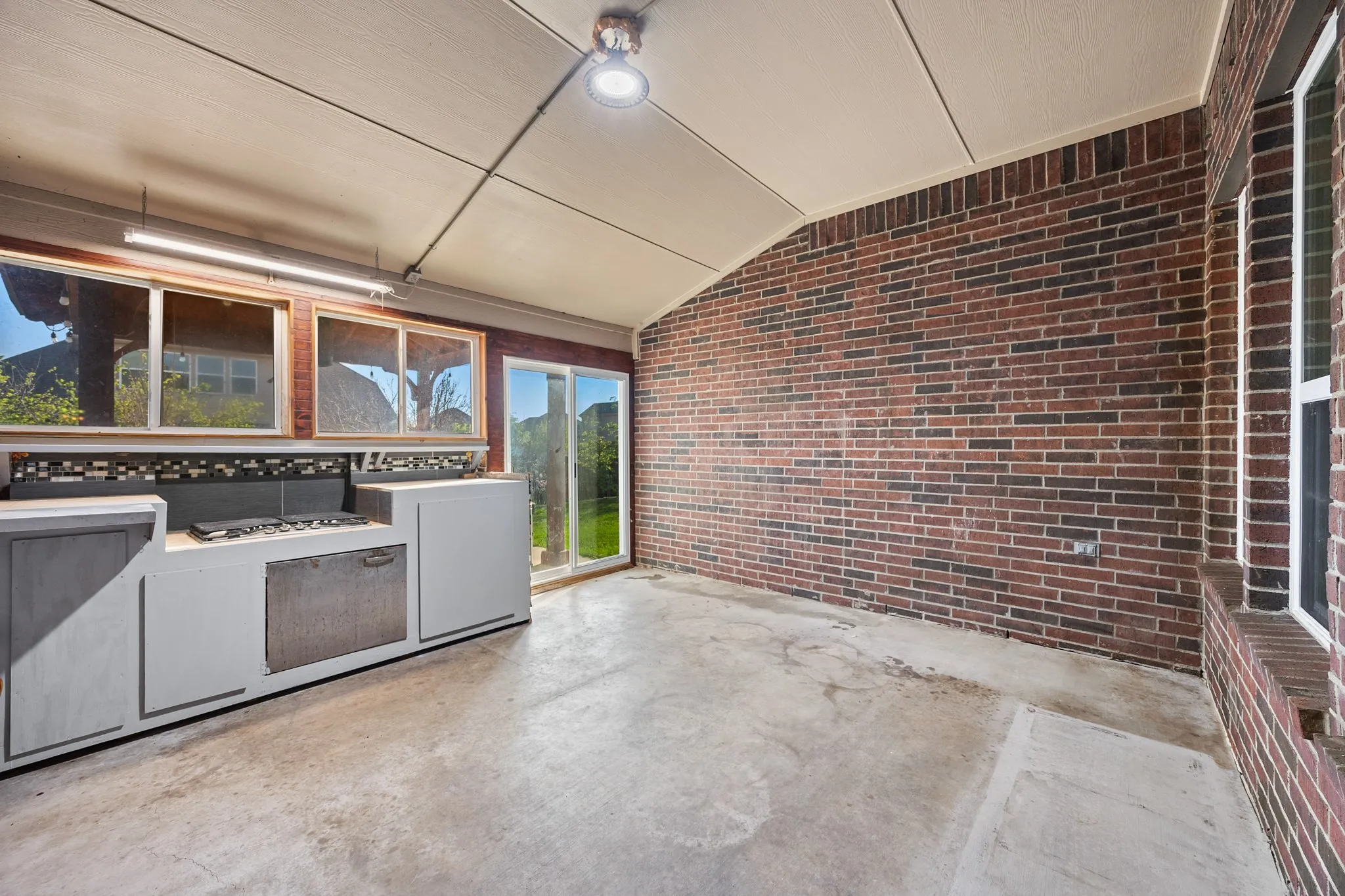 Enclosed Covered Patio with Outdoor kitchen