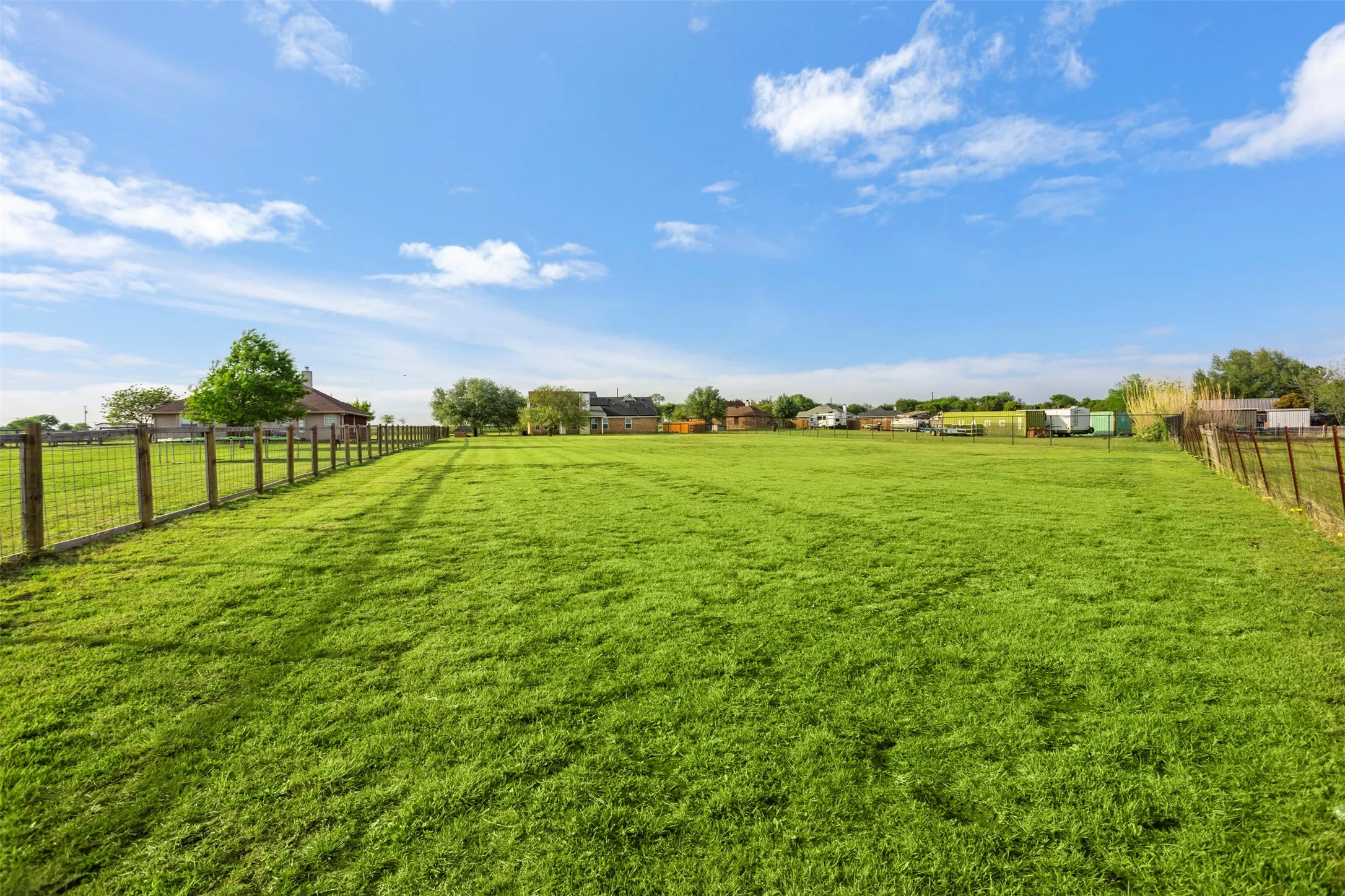 View of yard with a rural view