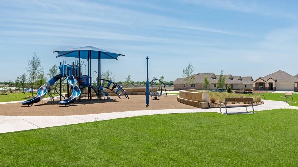 View of jungle gym featuring a lawn