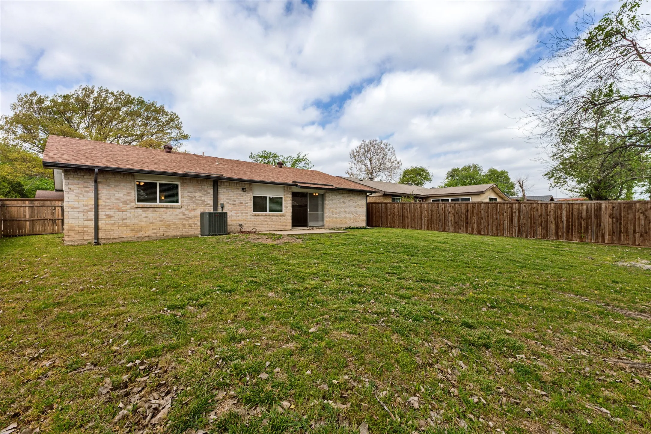 Backyard offers ample space, making it ideal for children to play, pets to roam, and for hosting BBQs.