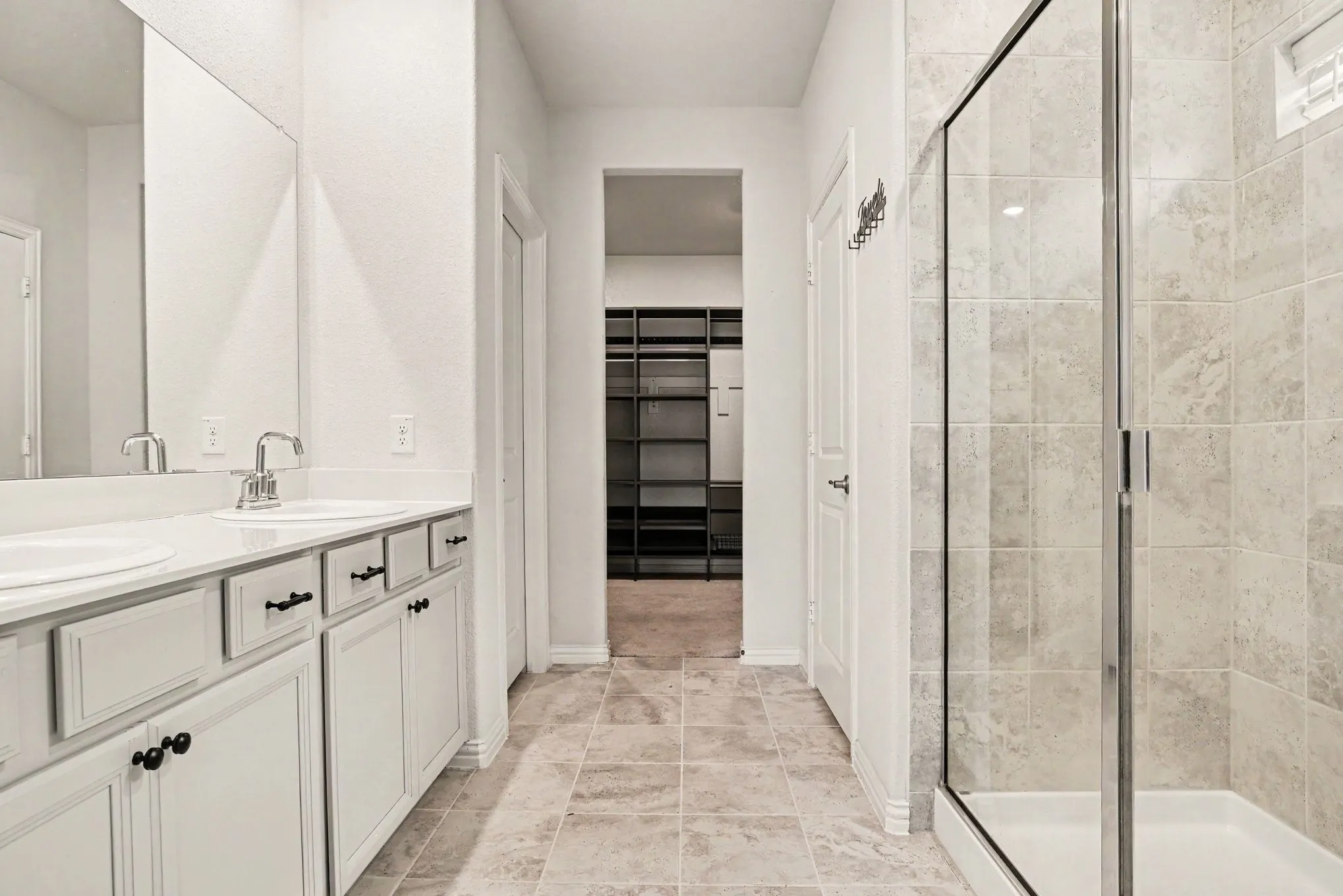 Primary bathroom custom closet shelves