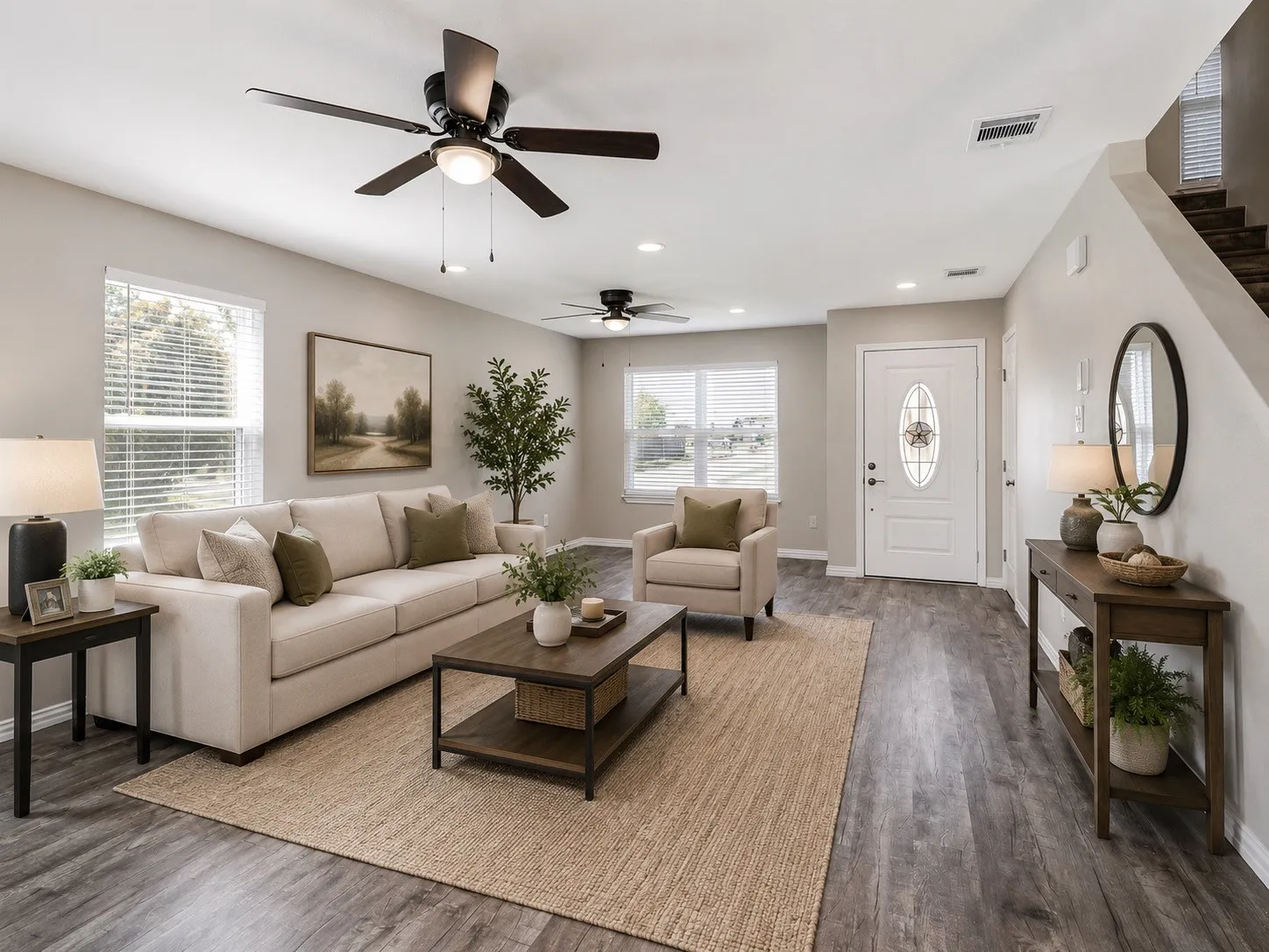 Open-concept living space featuring wood-finish flooring, recessed lighting, and multiple ceiling fans AI enhanced