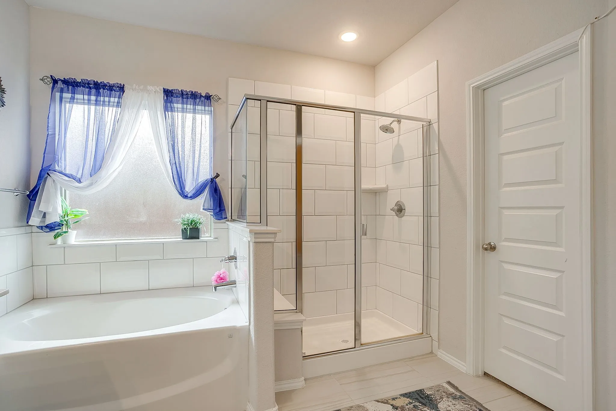 Separate tub and shower.