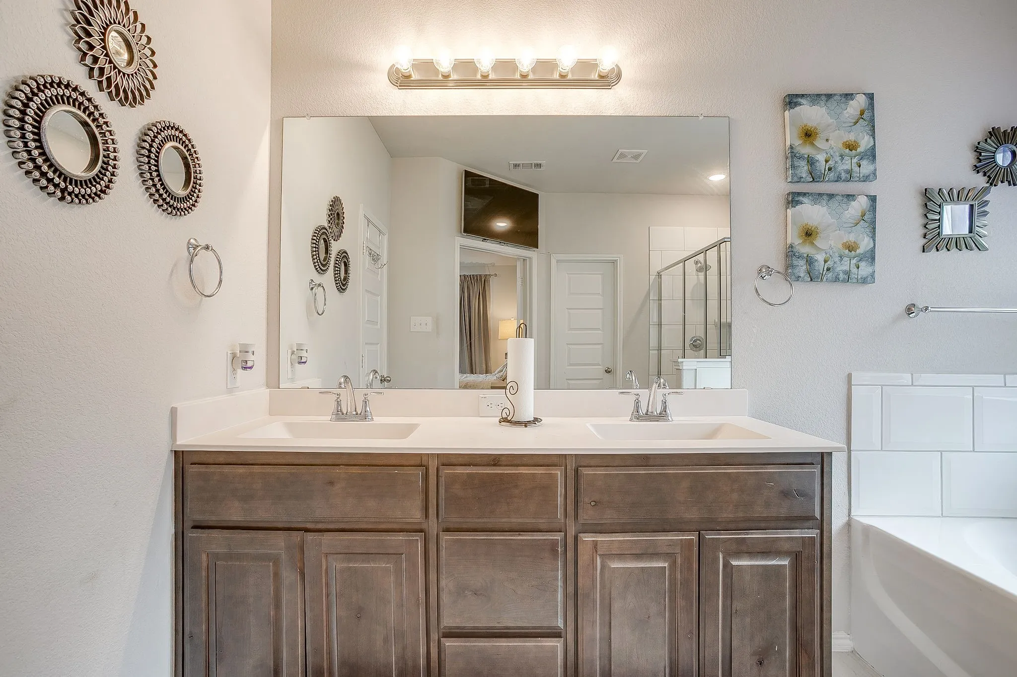 Double sinks in master suite.