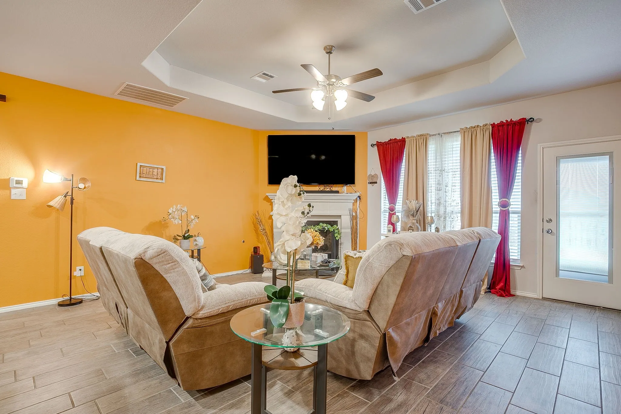Living room with corner fireplace.