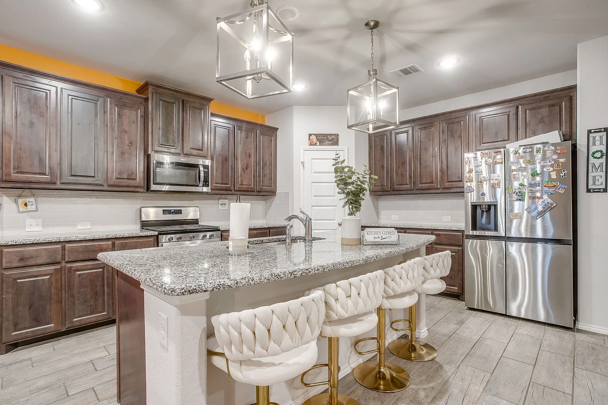 Built in microwave and stainless steel appliances.