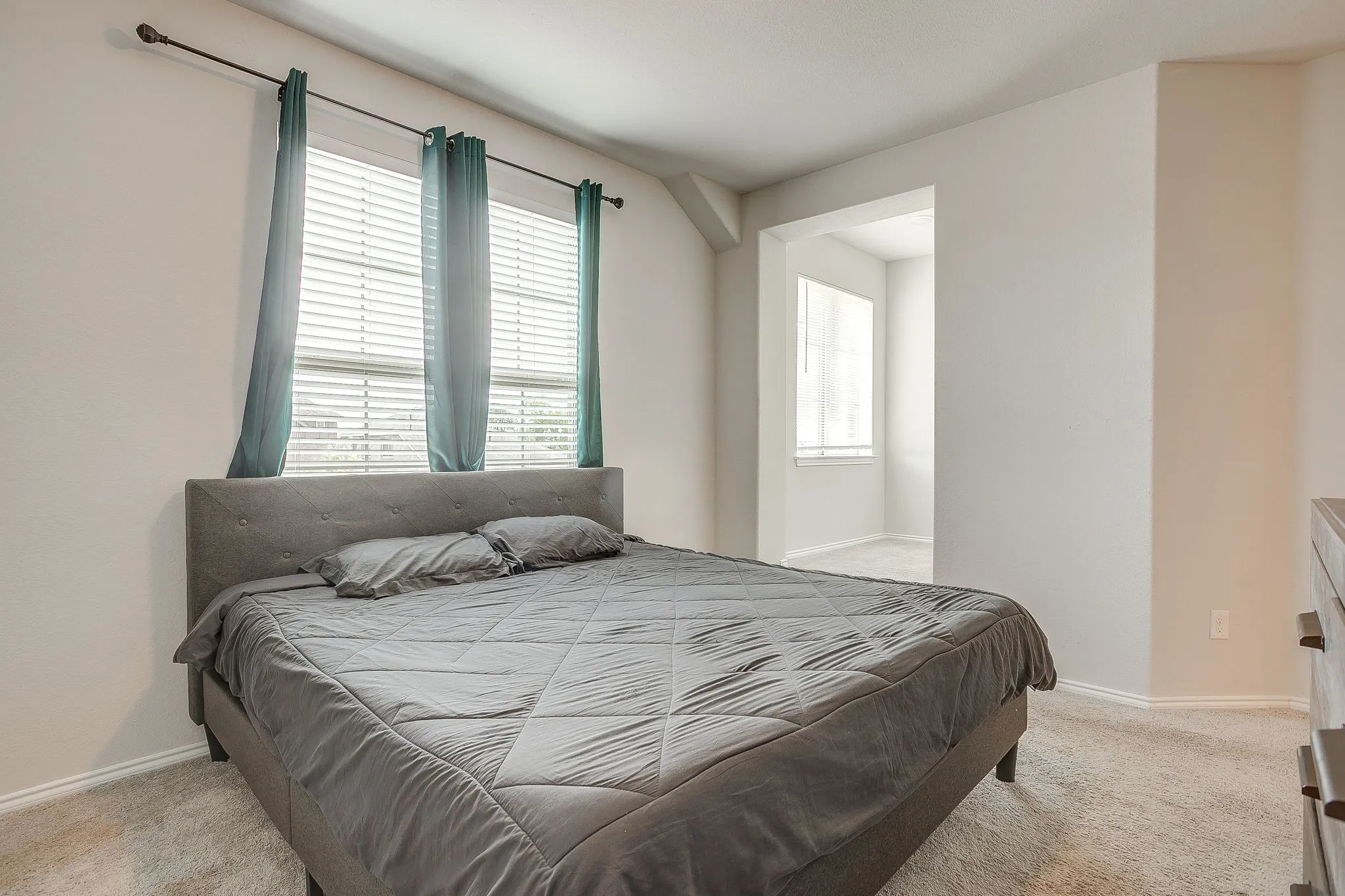 Large bedrooms with tall ceilings.