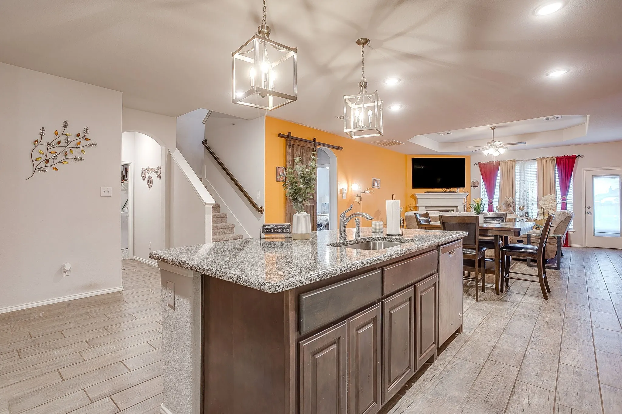 Open kitchen, living, and breakfast area.