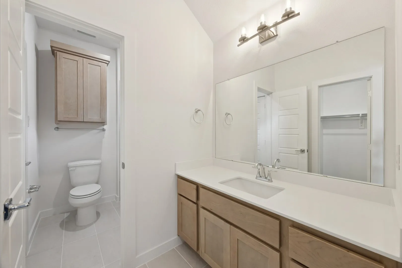 Bathroom in the Monet II home plan by Trophy Signature Homes – REPRESENTATIVE PHOTO