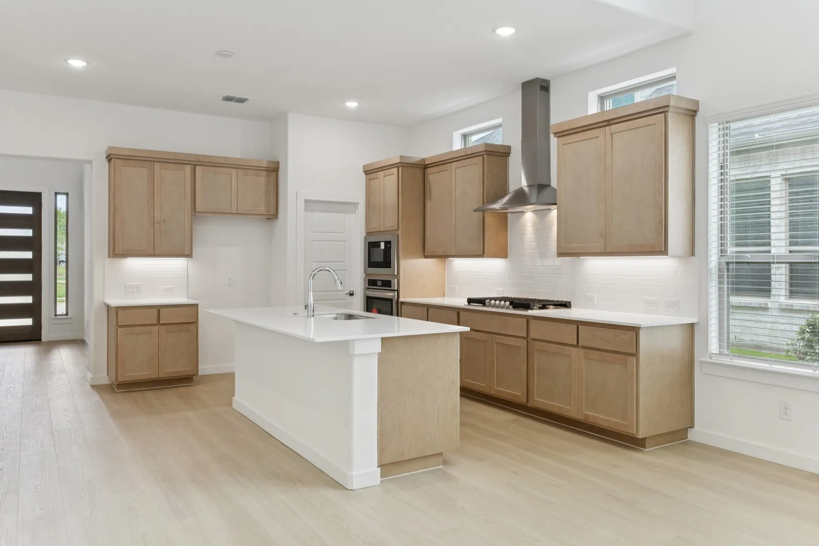 Kitchen in the Monet II home plan by Trophy Signature Homes – REPRESENTATIVE PHOTO