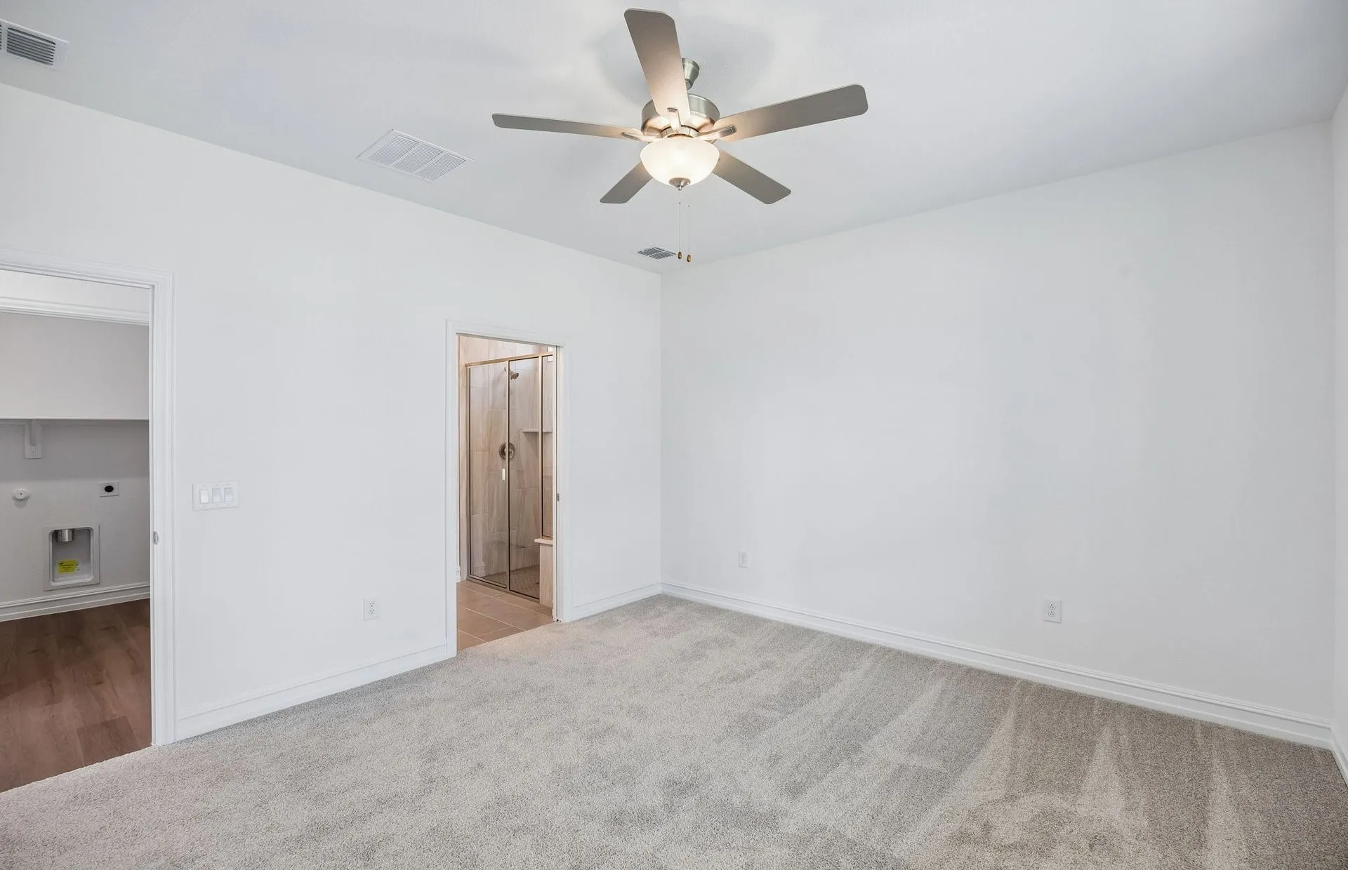 Spacious primary bedroom