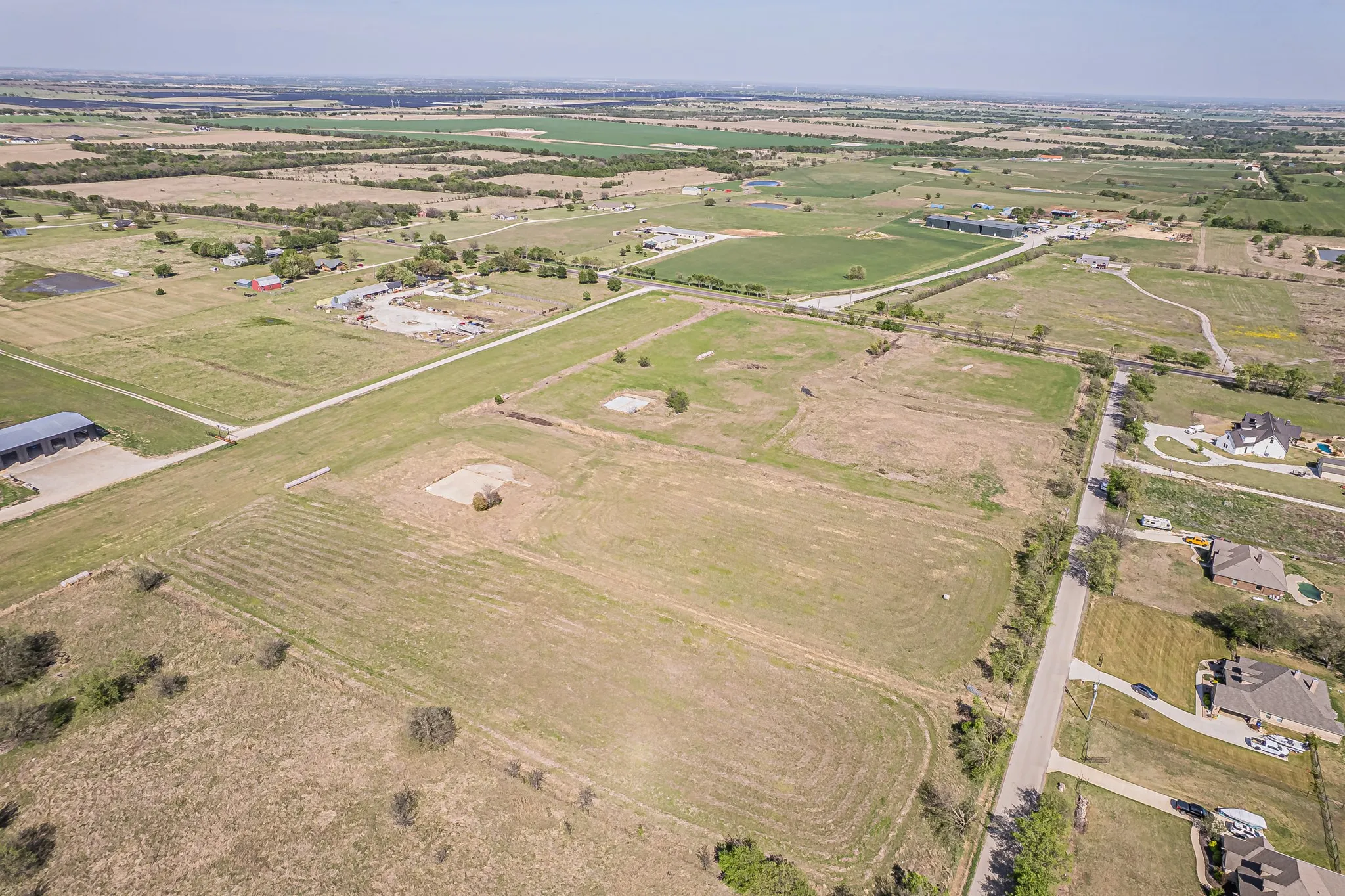 Aerial view of property's location featuring rural landscape
