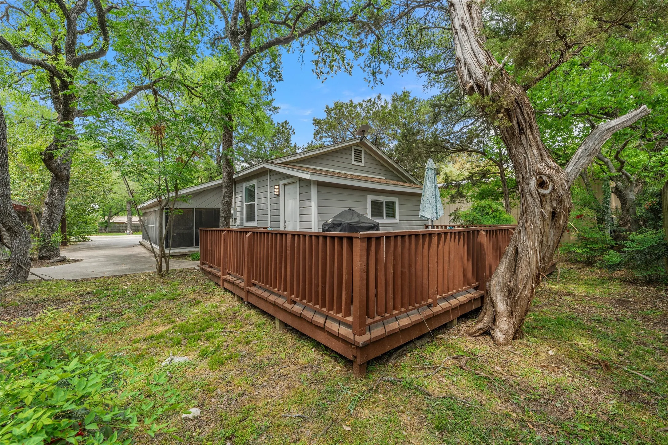 Back of house featuring a deck