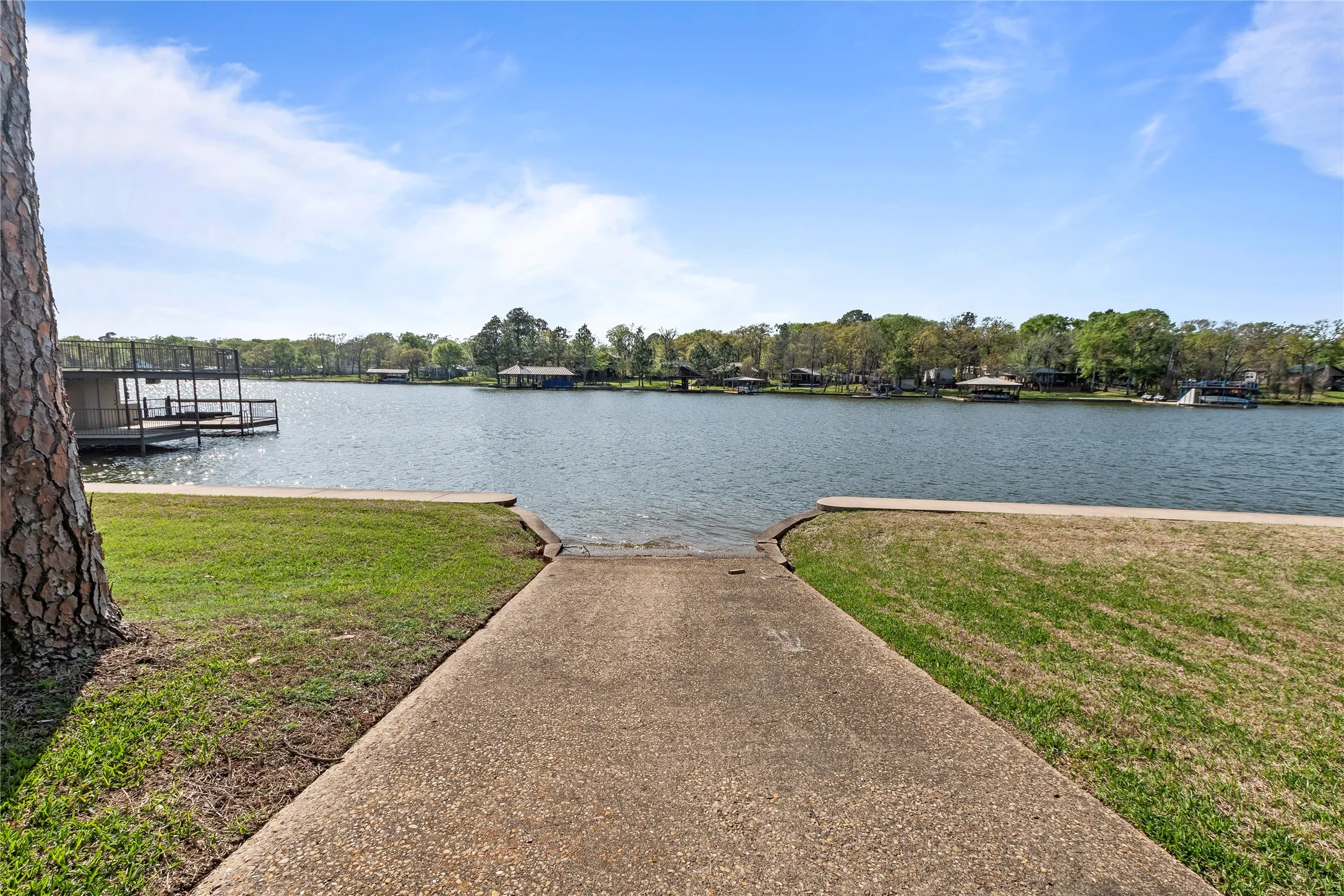 Private Ramp perfect for launching kayaks, paddle boards and easy access for swimming with the kids and pets