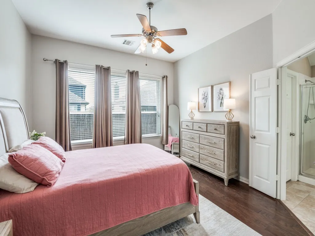 The ensuite is visible in this image, featuring privacy doors that allow one occupant to rise early without disturbing their partner.