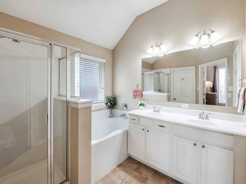 This is an exceptionally deep soaking tub. You have to see it in person. Spacious shower and vanity.
