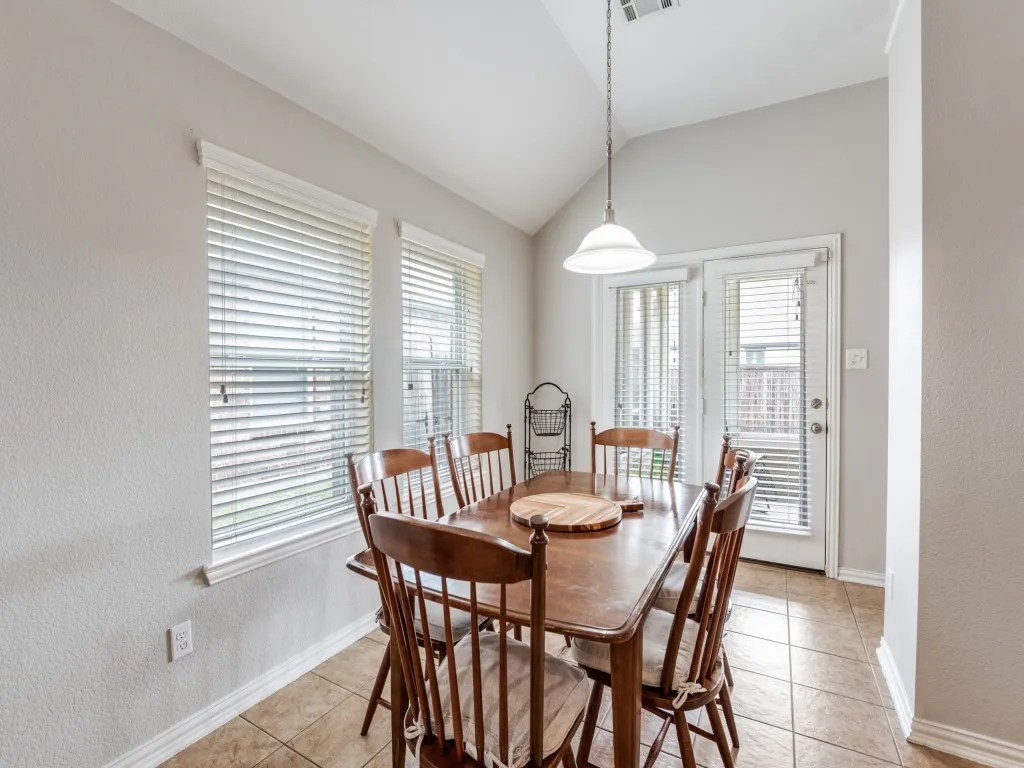 The breakfast room leads directly into the sunroom and provides access to the backyard.