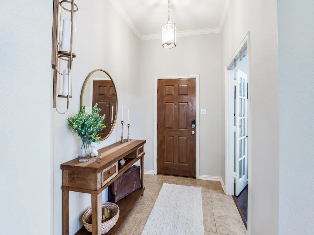 Step into your ideal living space. The door on the right leads to your home office.