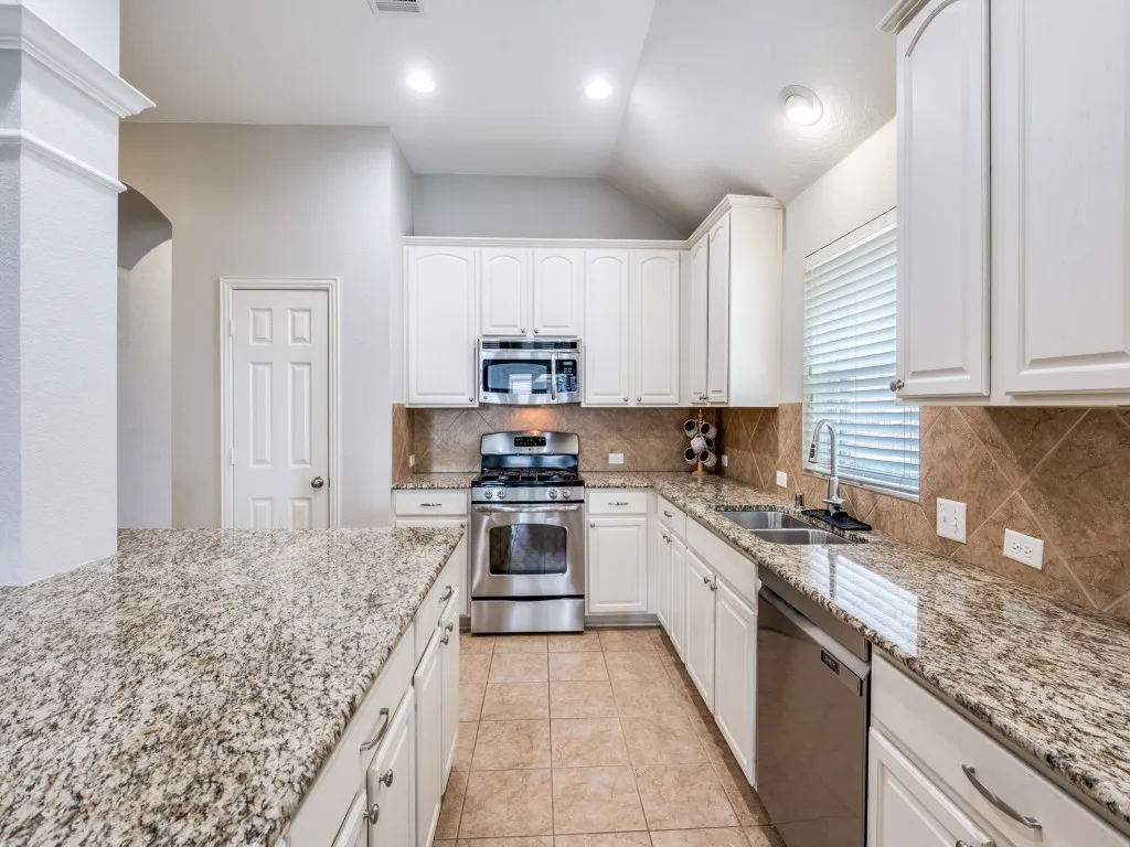 Check out all the cabinets in this kitchen.  There is so much storage space.