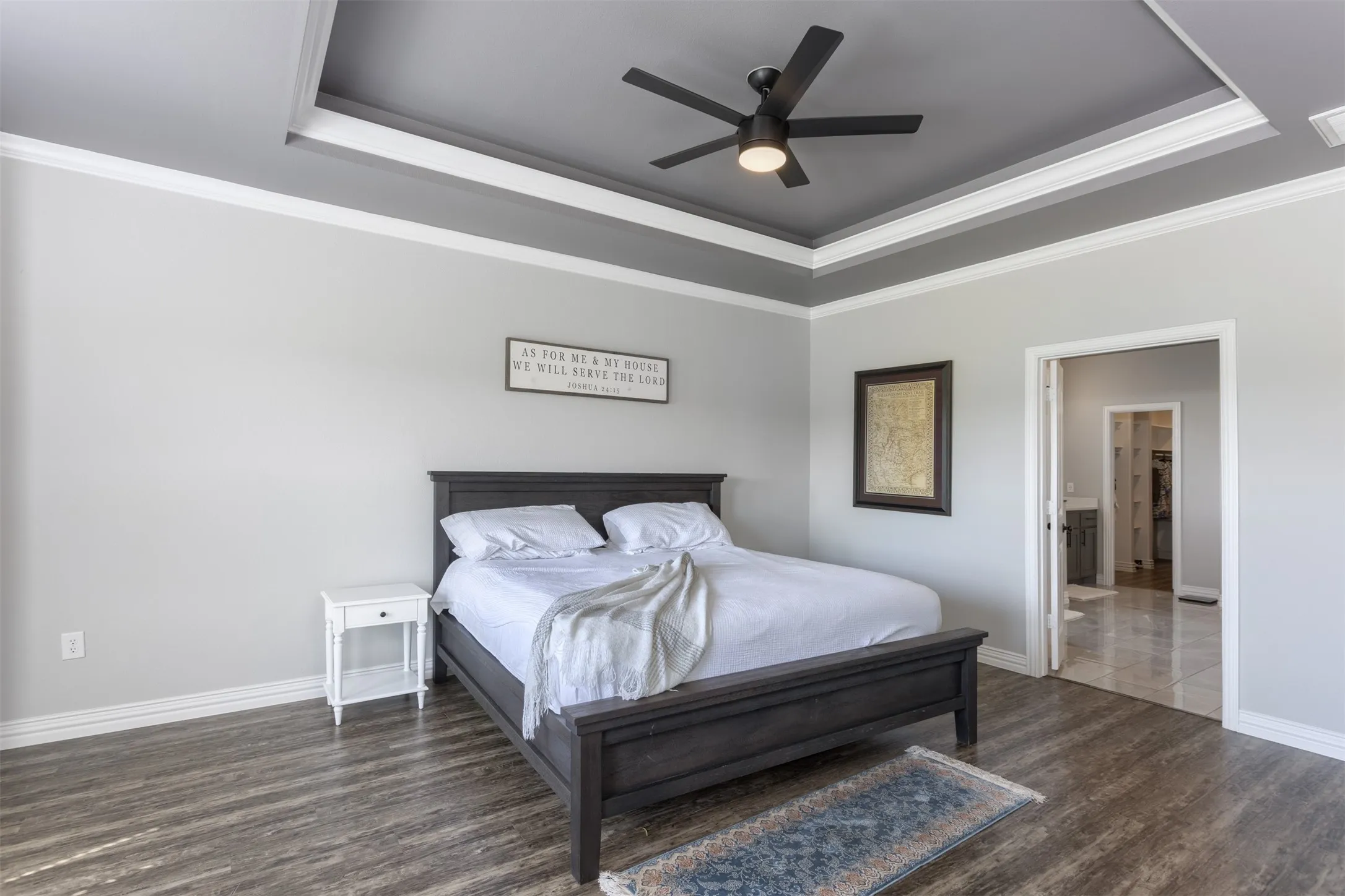 Primary bedroom features a trayed ceiling with lighting.  Just one of the special touches from this builder