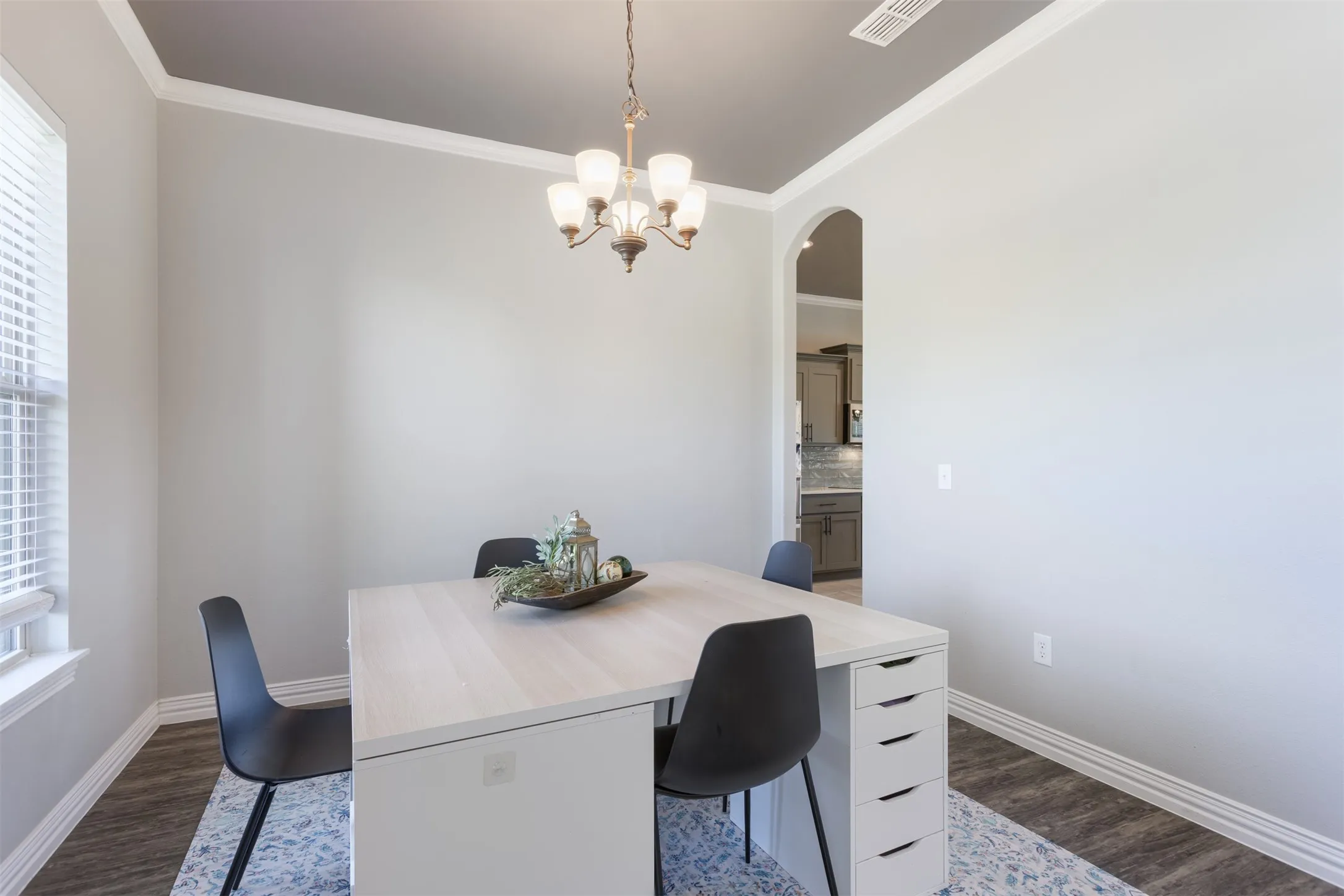 With a large dining space off the kitchen, the dining room has flexed into a home-school room. Spacious and bright, it will compliment however you decide to use it.