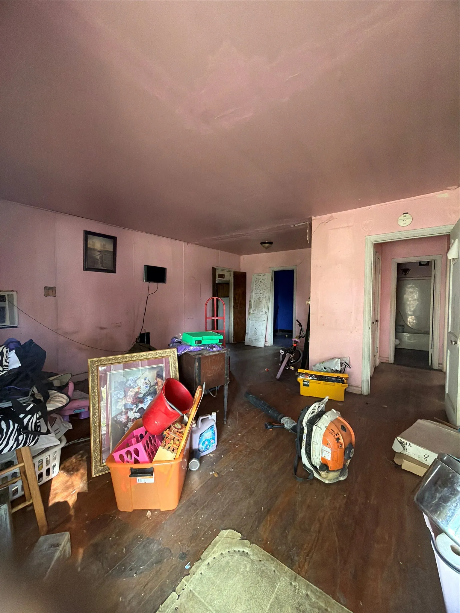 Living area with hardwood / wood-style flooring