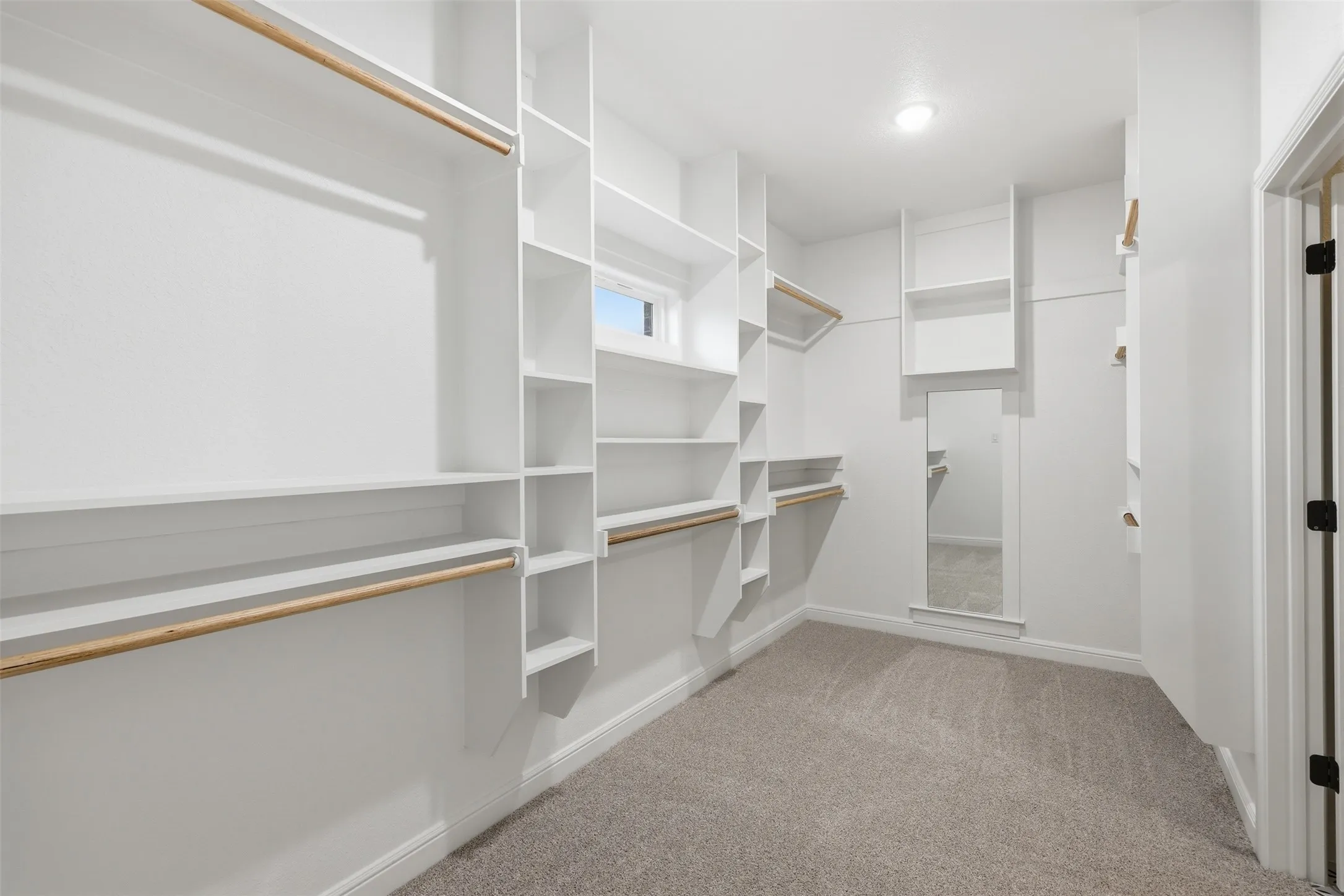 Built ins and so much closet space in the primary closet