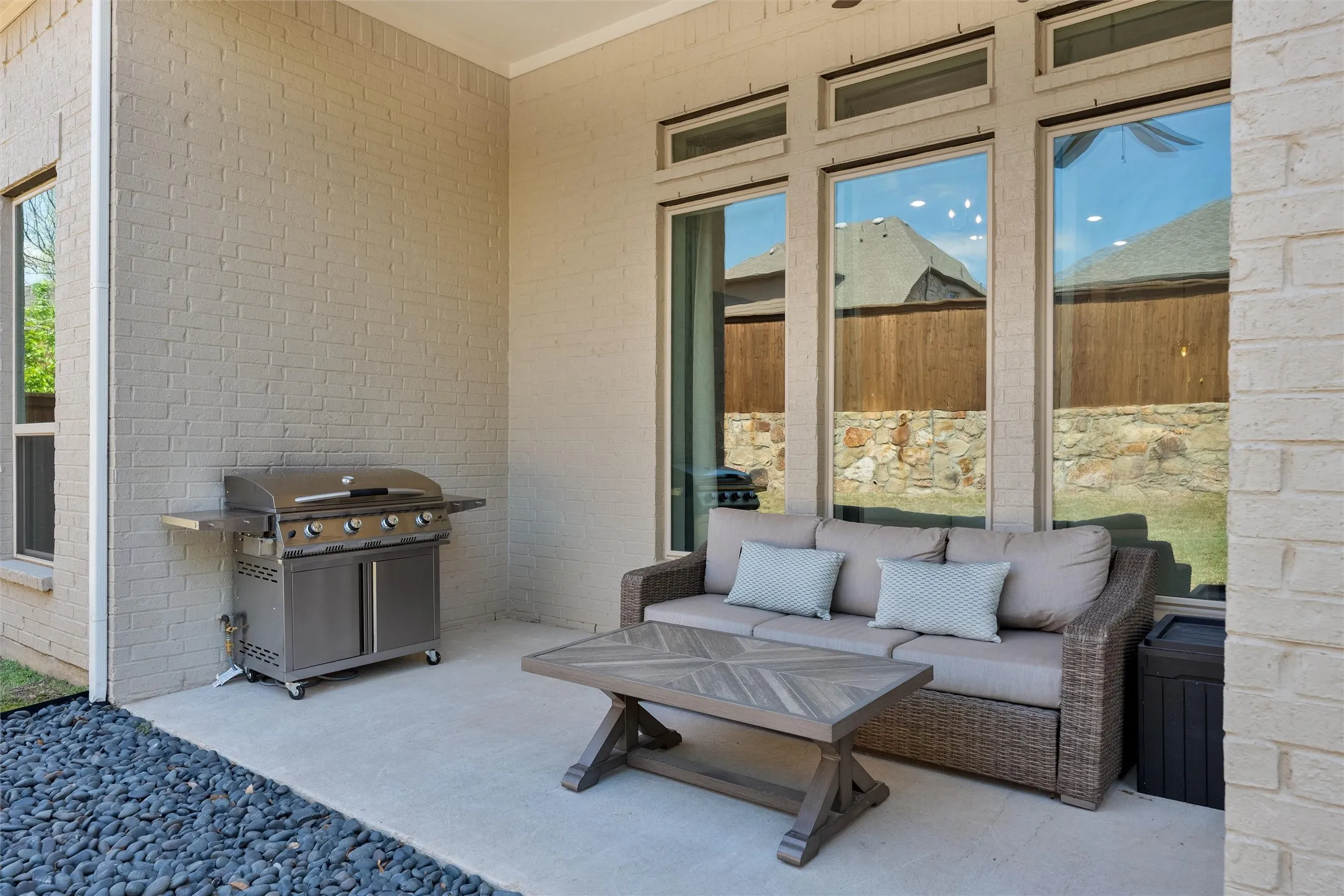 Covered back patio perfect for entertainment.
