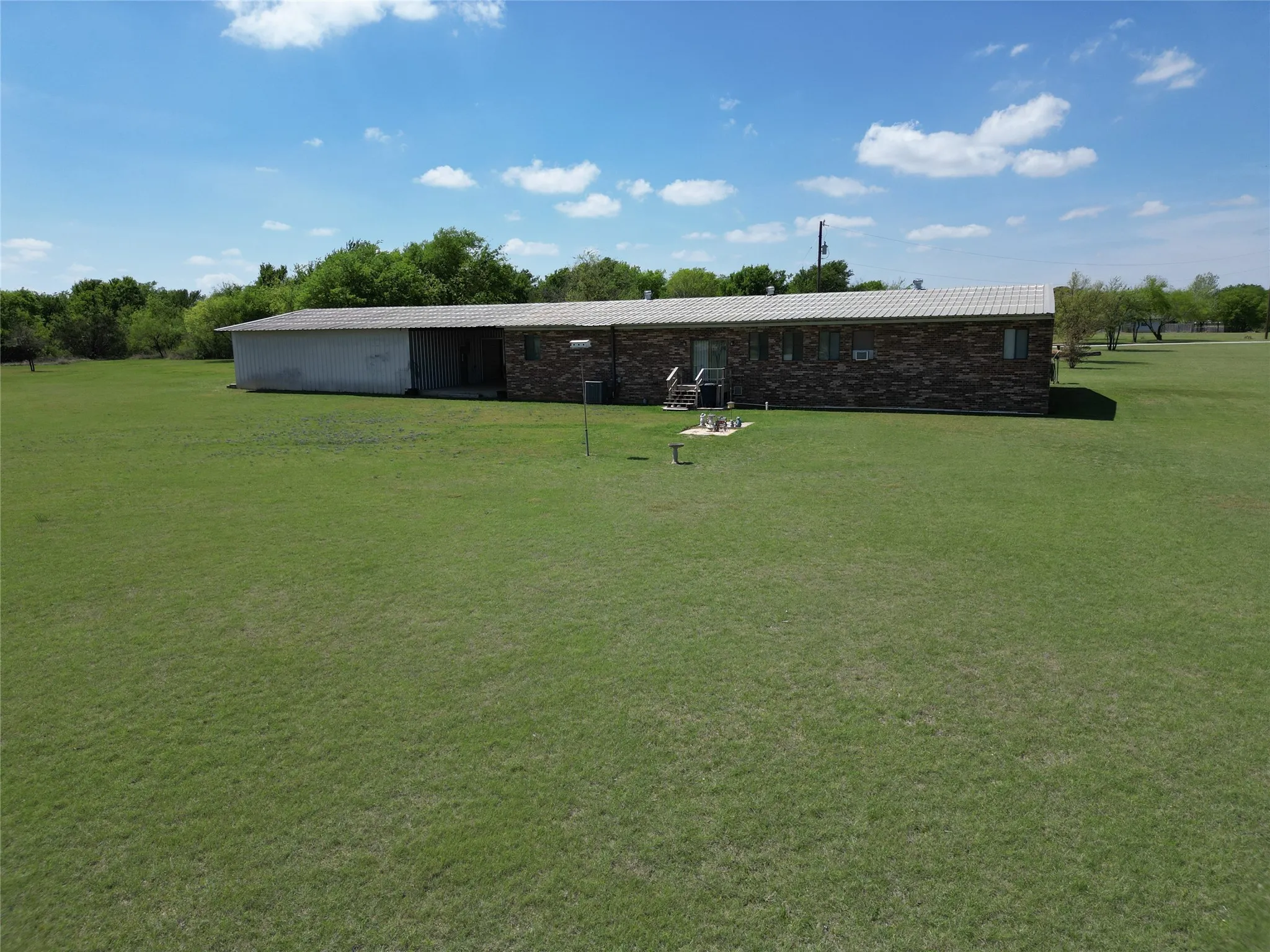 View of community with an outbuilding