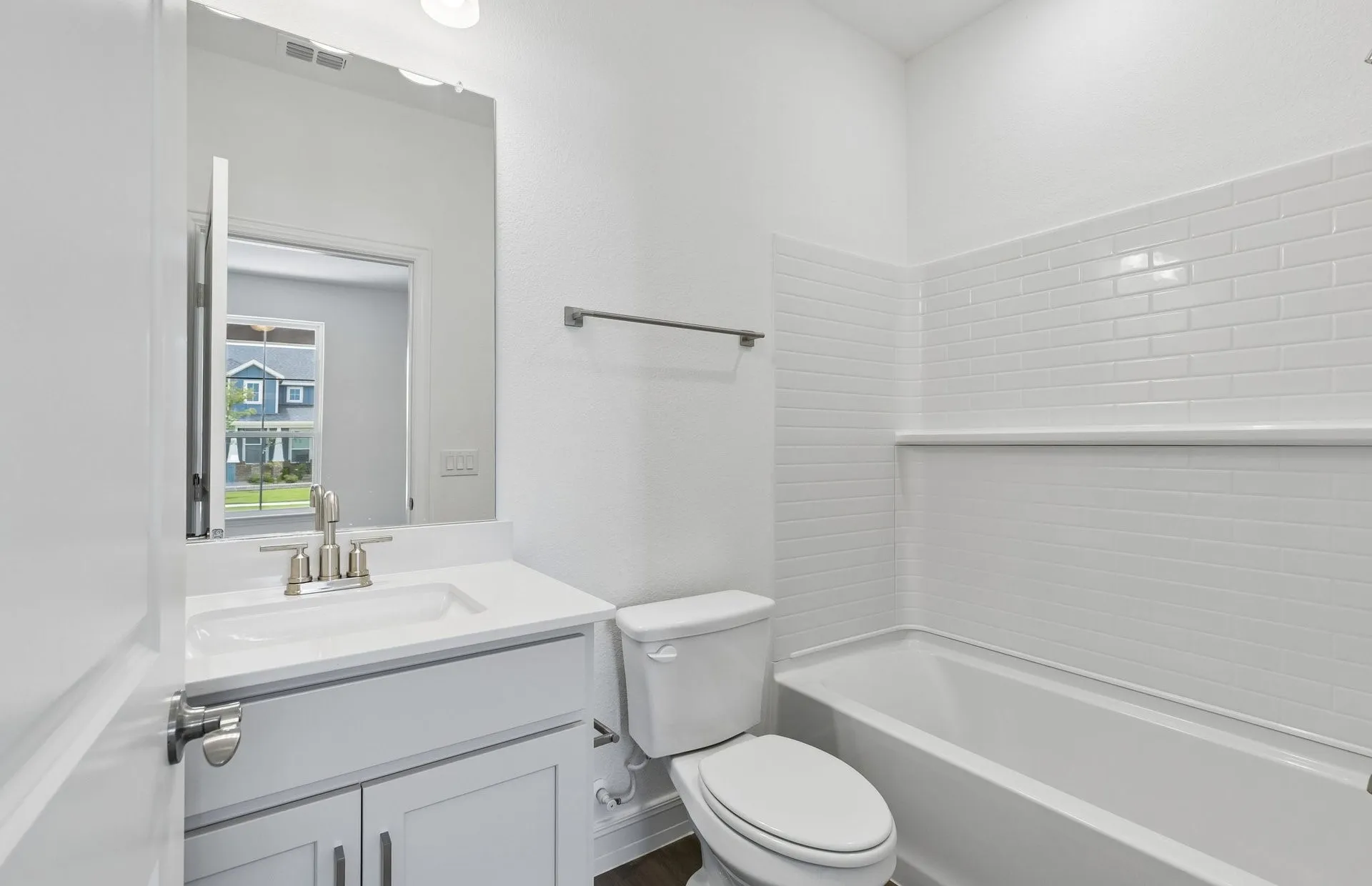 Secondary bath with tile surrounded shower