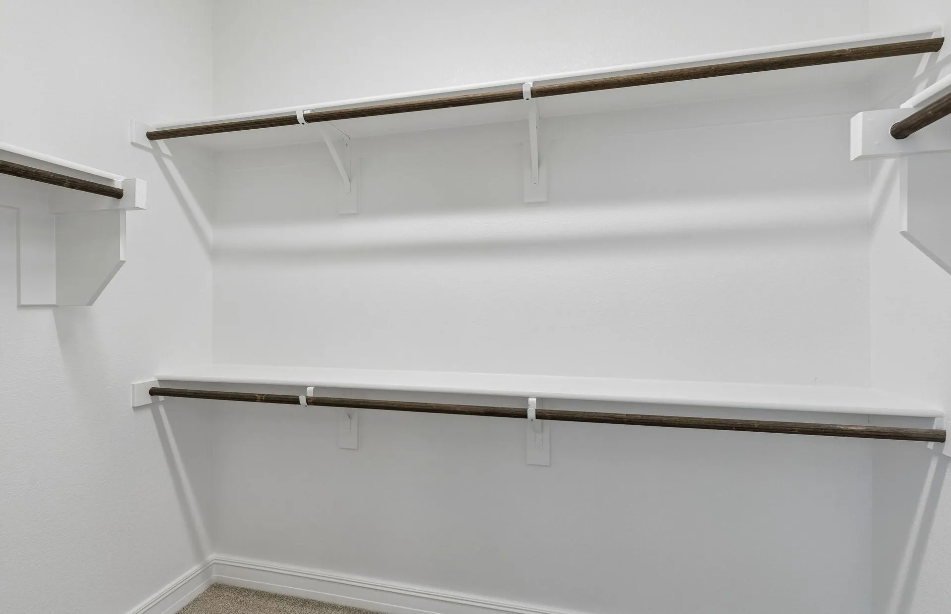 Walk-in closet in owners suite