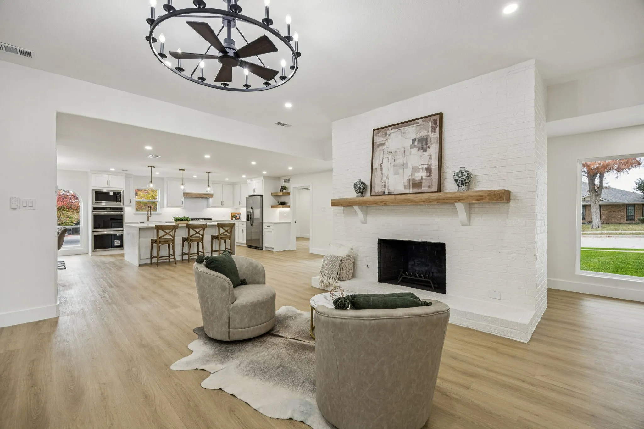 Fireplace anchors the living area and is such a warm space to relax in.