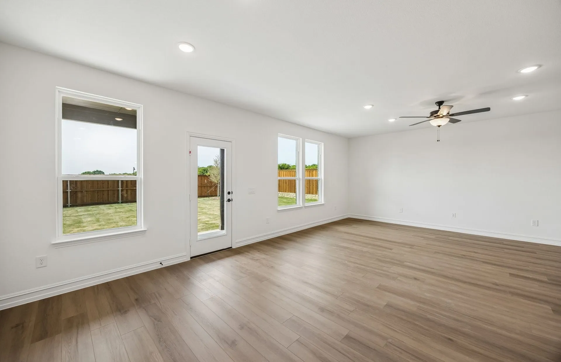 Large windows and natural light in gathering room