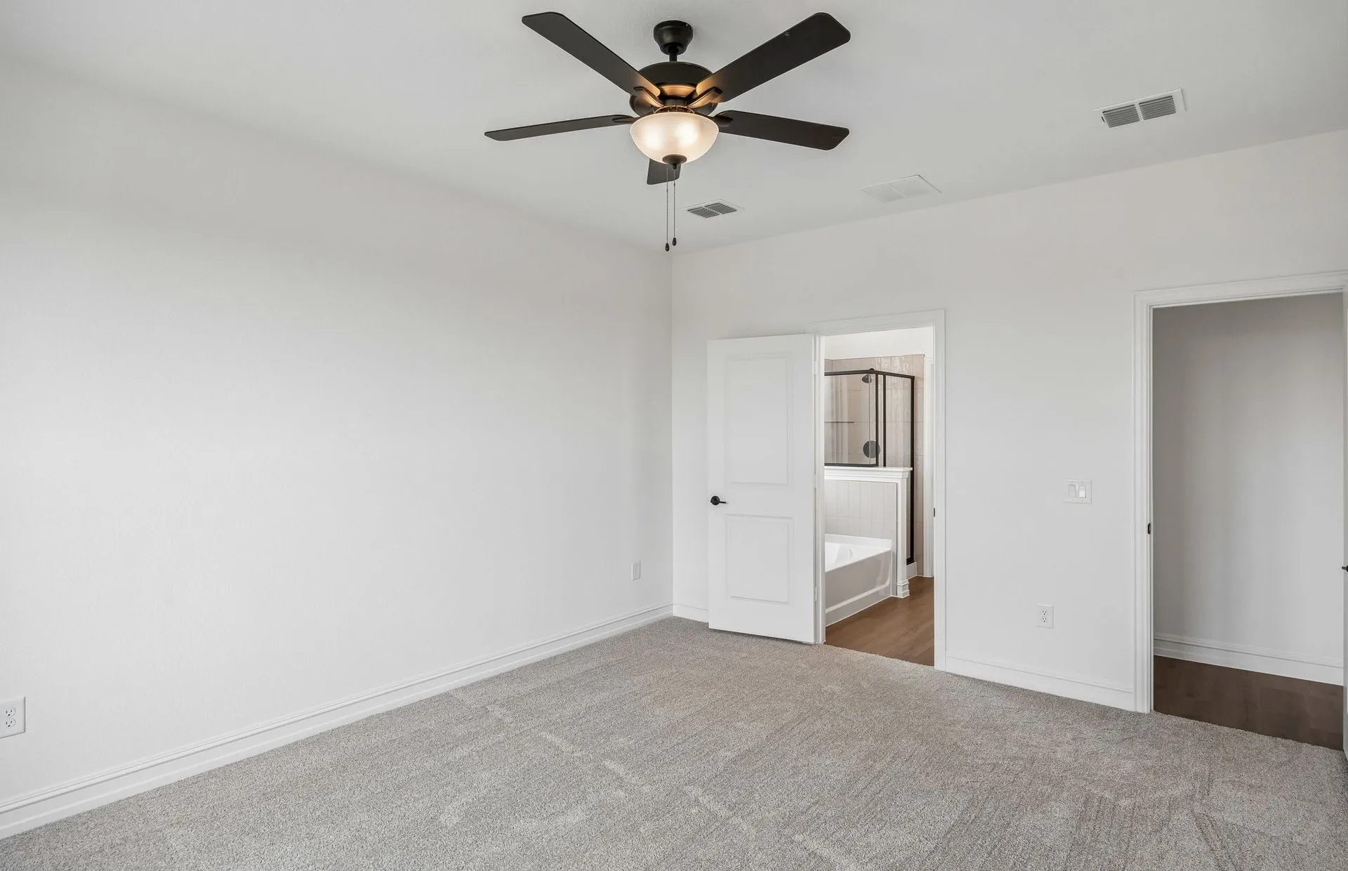 Spacious primary bedroom