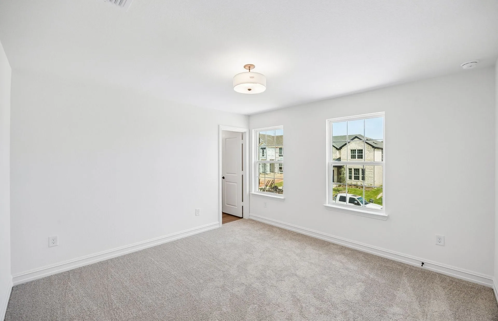 Secondary bedroom with large windows