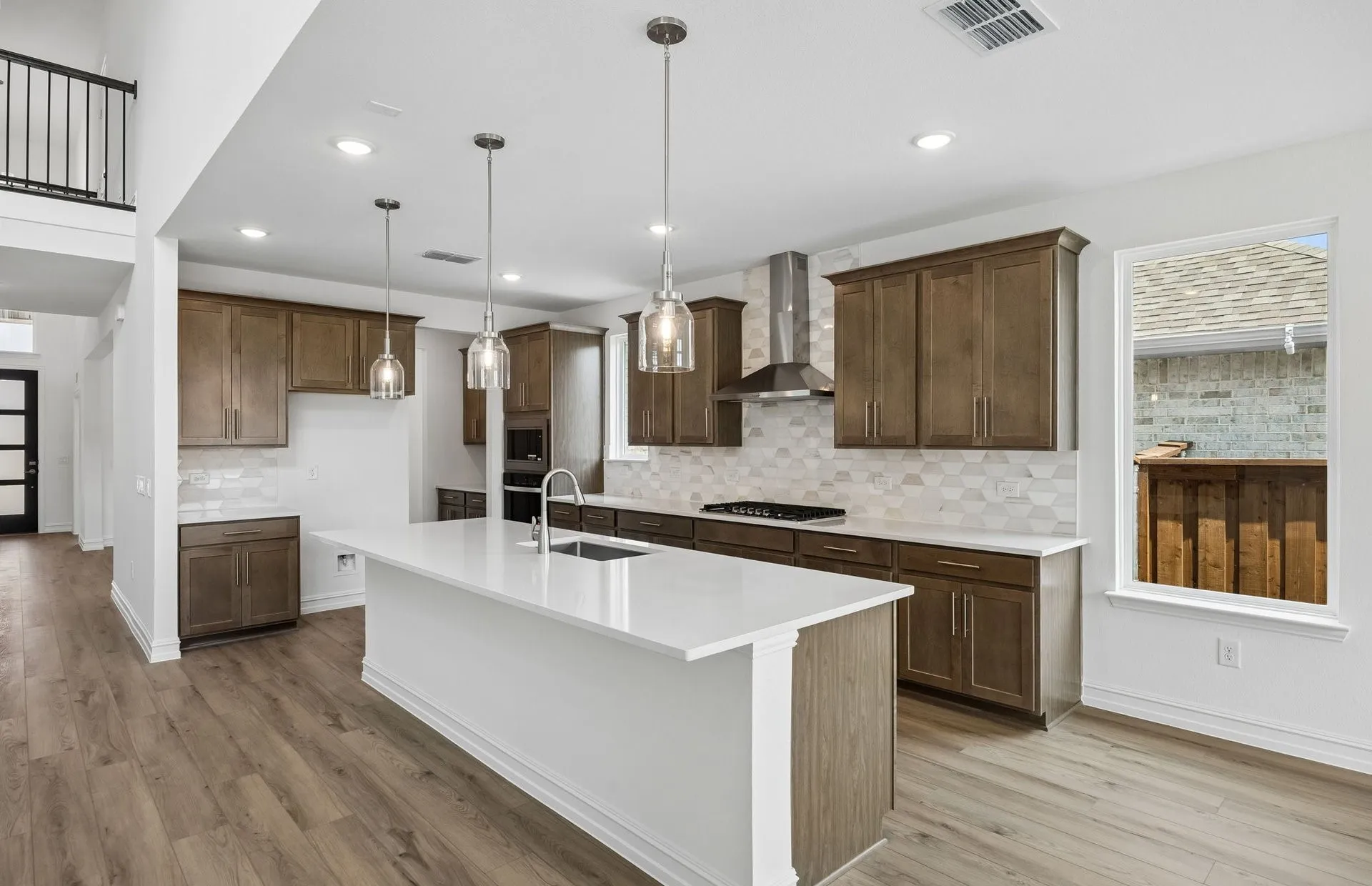 Kitchen with eat-in bartop island
