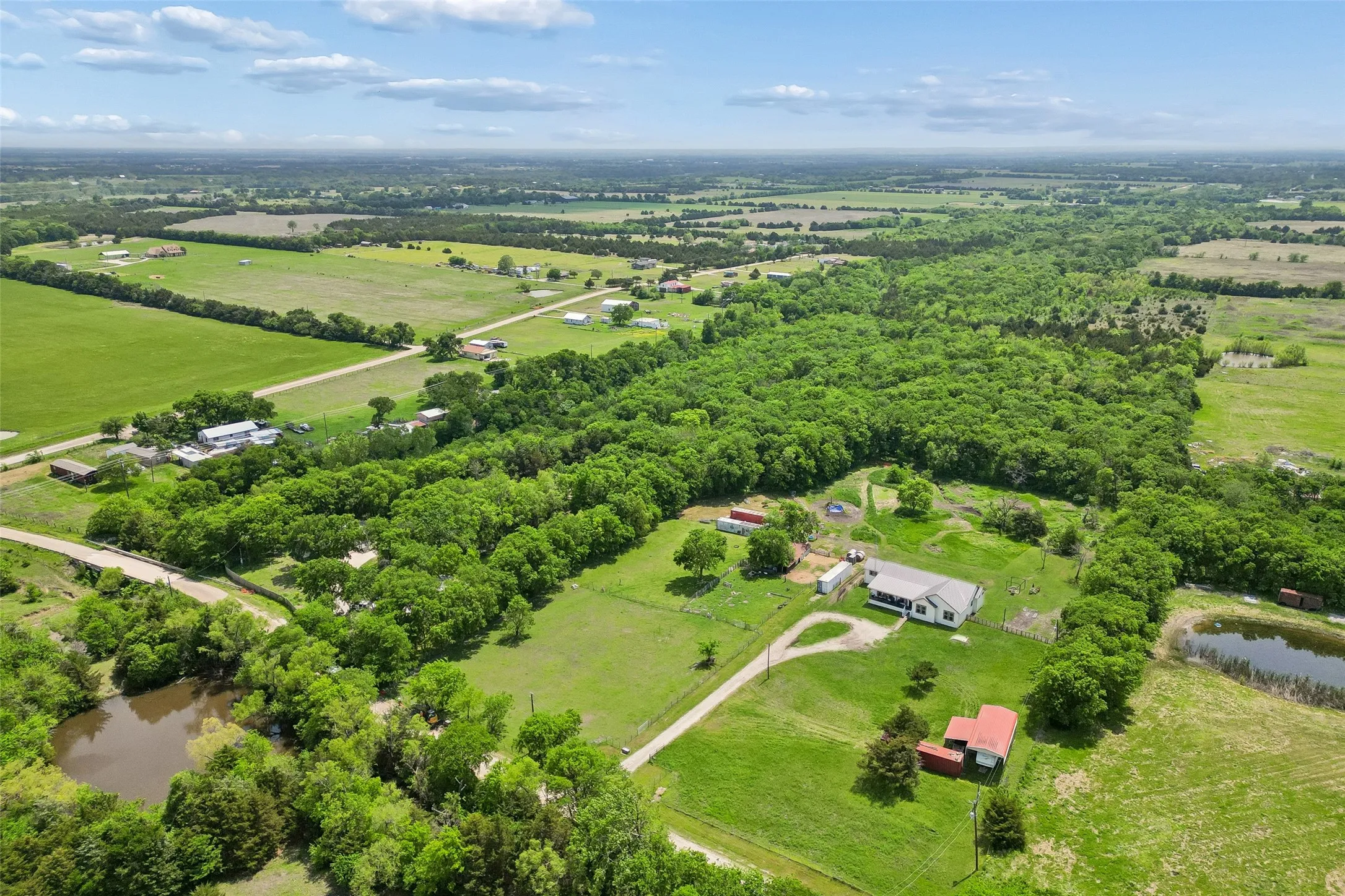 Farm For Sale in Fannin County , 579 County Road 5005, Blue Ridge, Texas 75424, 4 Bedrooms, 3 Bathrooms, Garage spaces, 2,900 Sqft, built in 2020, Preowned, Price $1,150,000, mls#21228401, Real Estate Agent in Blue Ridge, Homes For Sale in Fannin county, Homes For Sale in Blue Ridge, Realtor in Blue Ridge Texas, Real Estate Brokerage Independent Realty Texas, Luminita Cordes Realtor