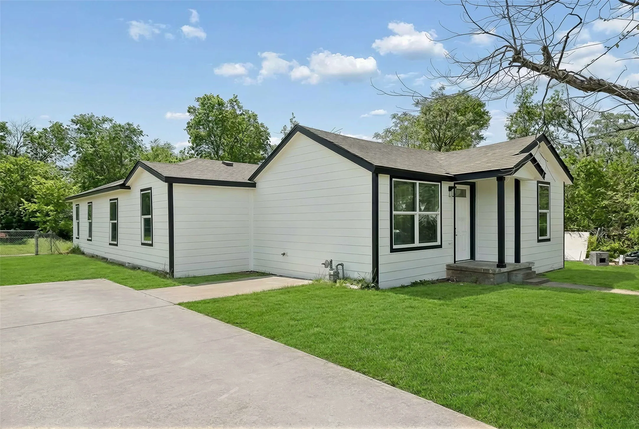 View of property exterior featuring roof with shingles