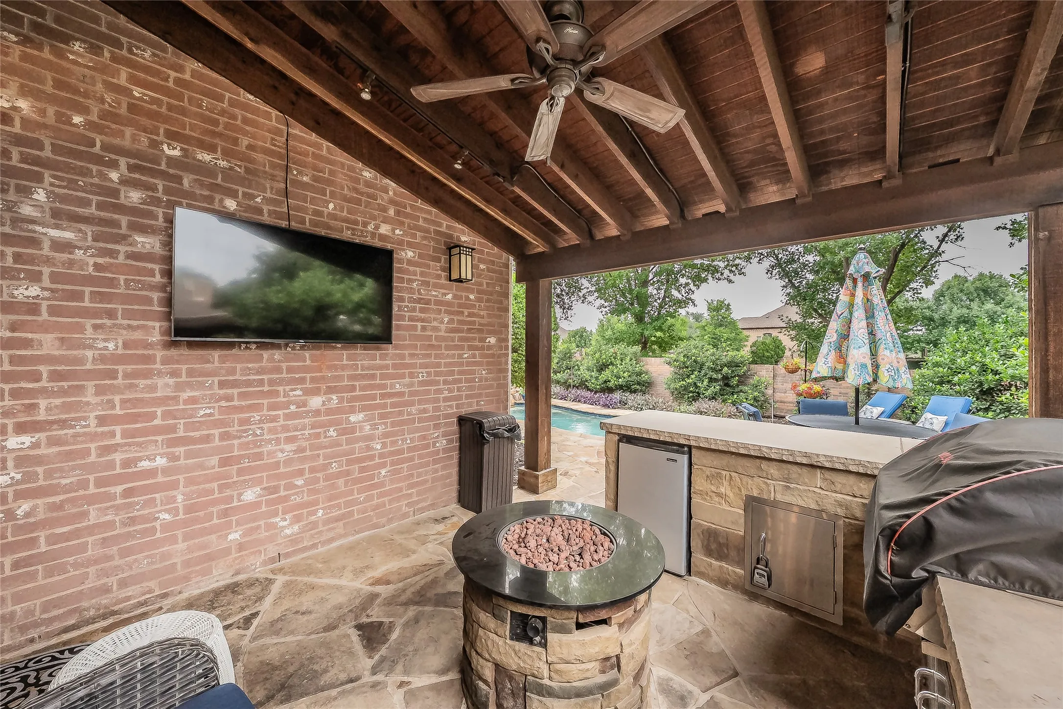Comfortable outdoor space with covered seating area