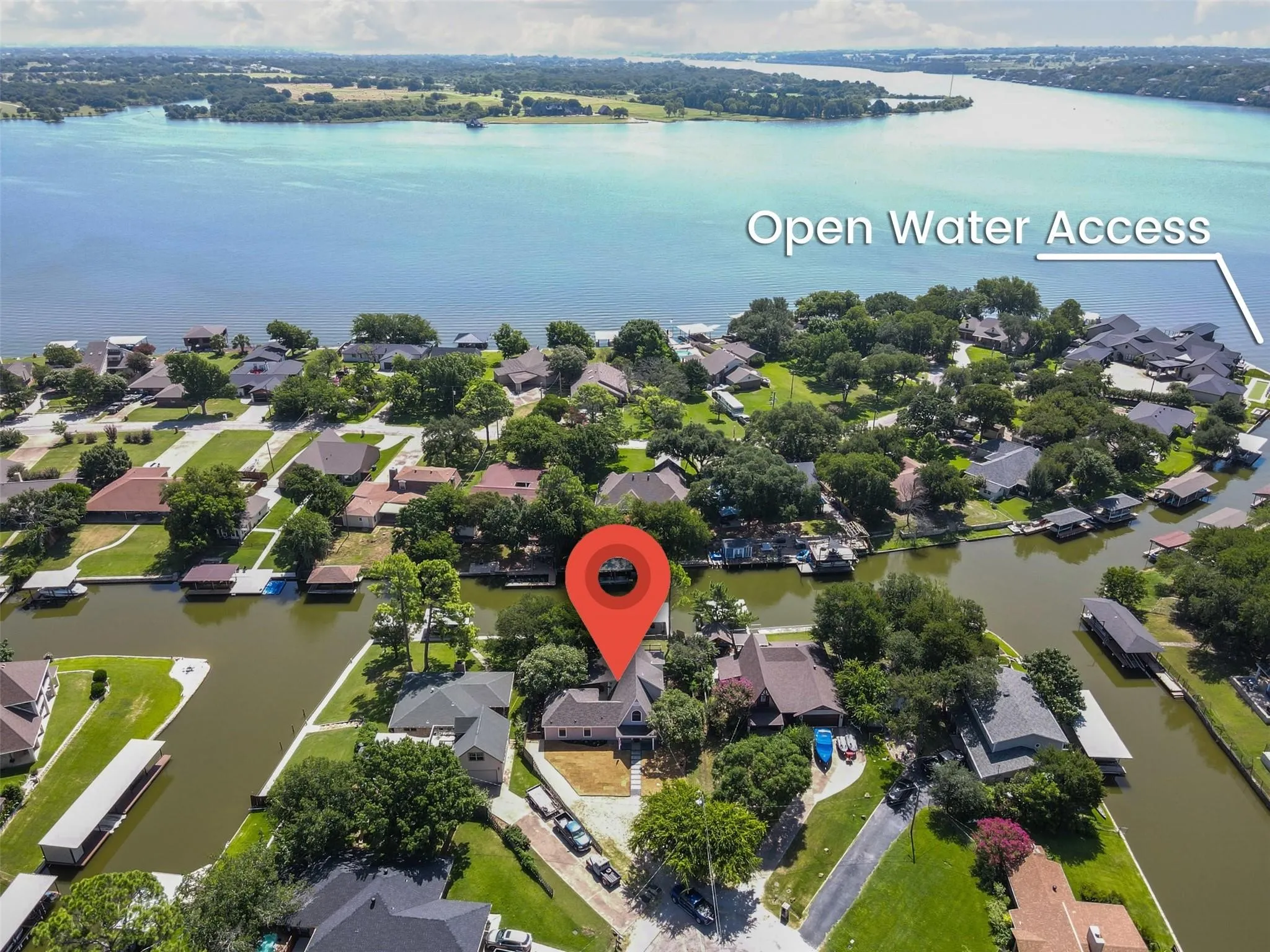 Aerial view of residential area with a nearby body of water