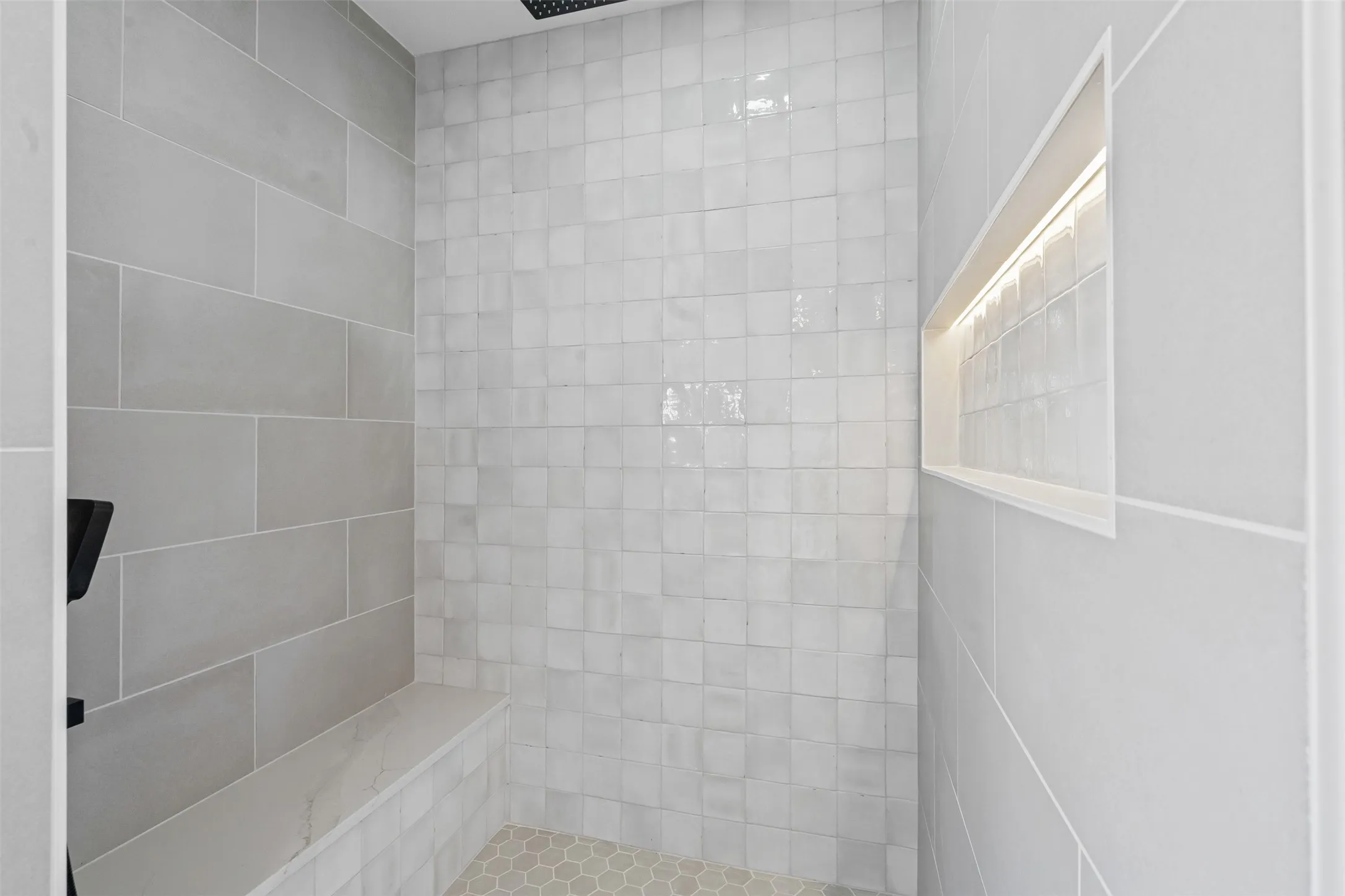 Full bath with tiled shower